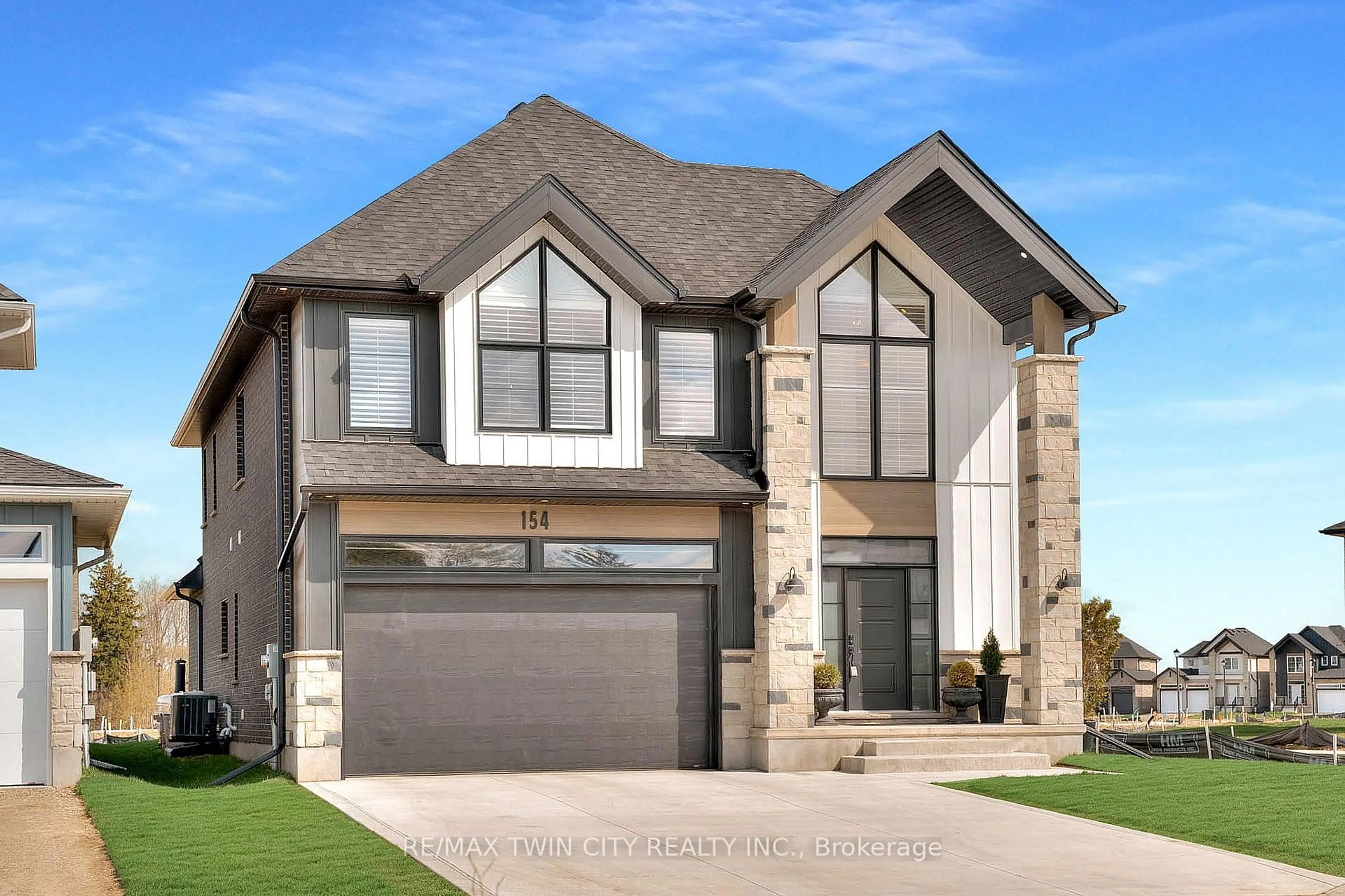 Home with brick exterior material, street for 154 Dempsey Dr, Stratford Ontario N5A 0R5