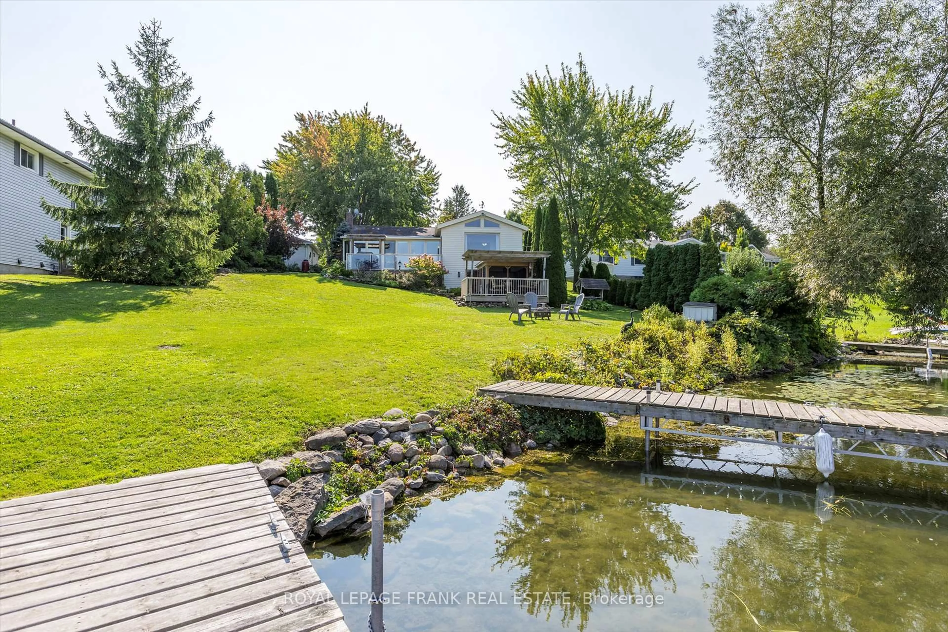 A pic from outside/outdoor area/front of a property/back of a property/a pic from drone, water/lake/river/ocean view for 490 McConnell Dr, Selwyn Ontario K9J 0C5