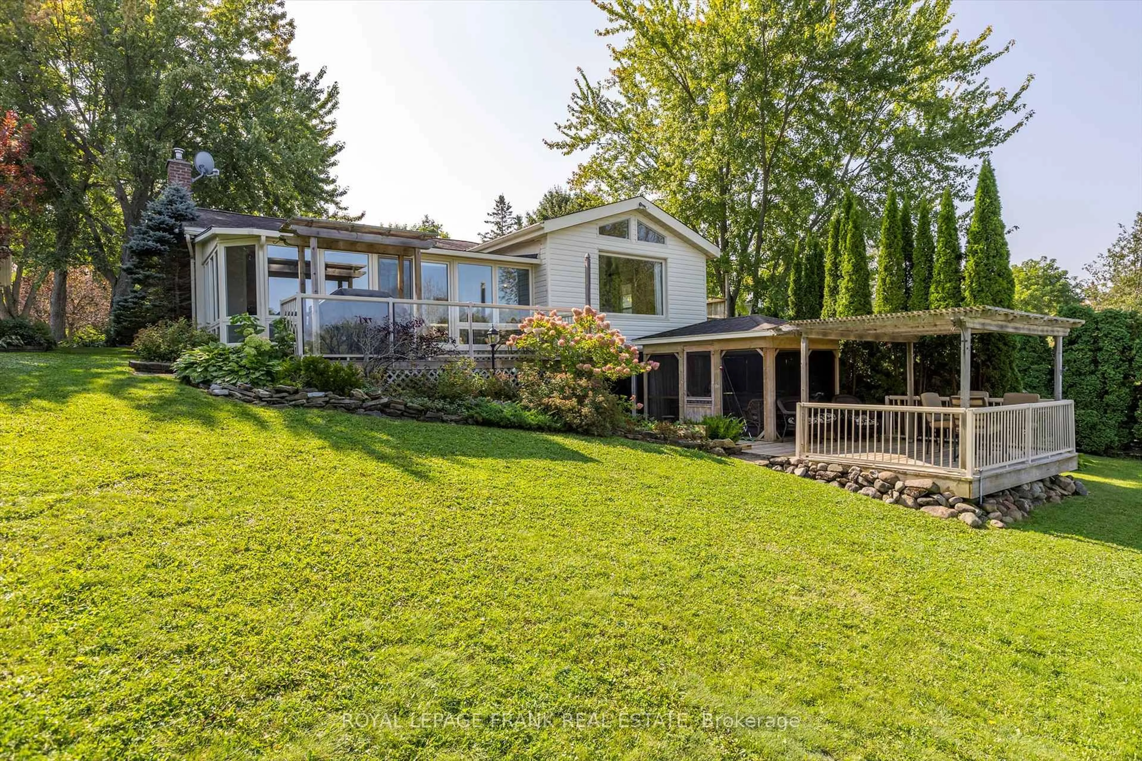 A pic from outside/outdoor area/front of a property/back of a property/a pic from drone, water/lake/river/ocean view for 490 McConnell Dr, Selwyn Ontario K9J 0C5