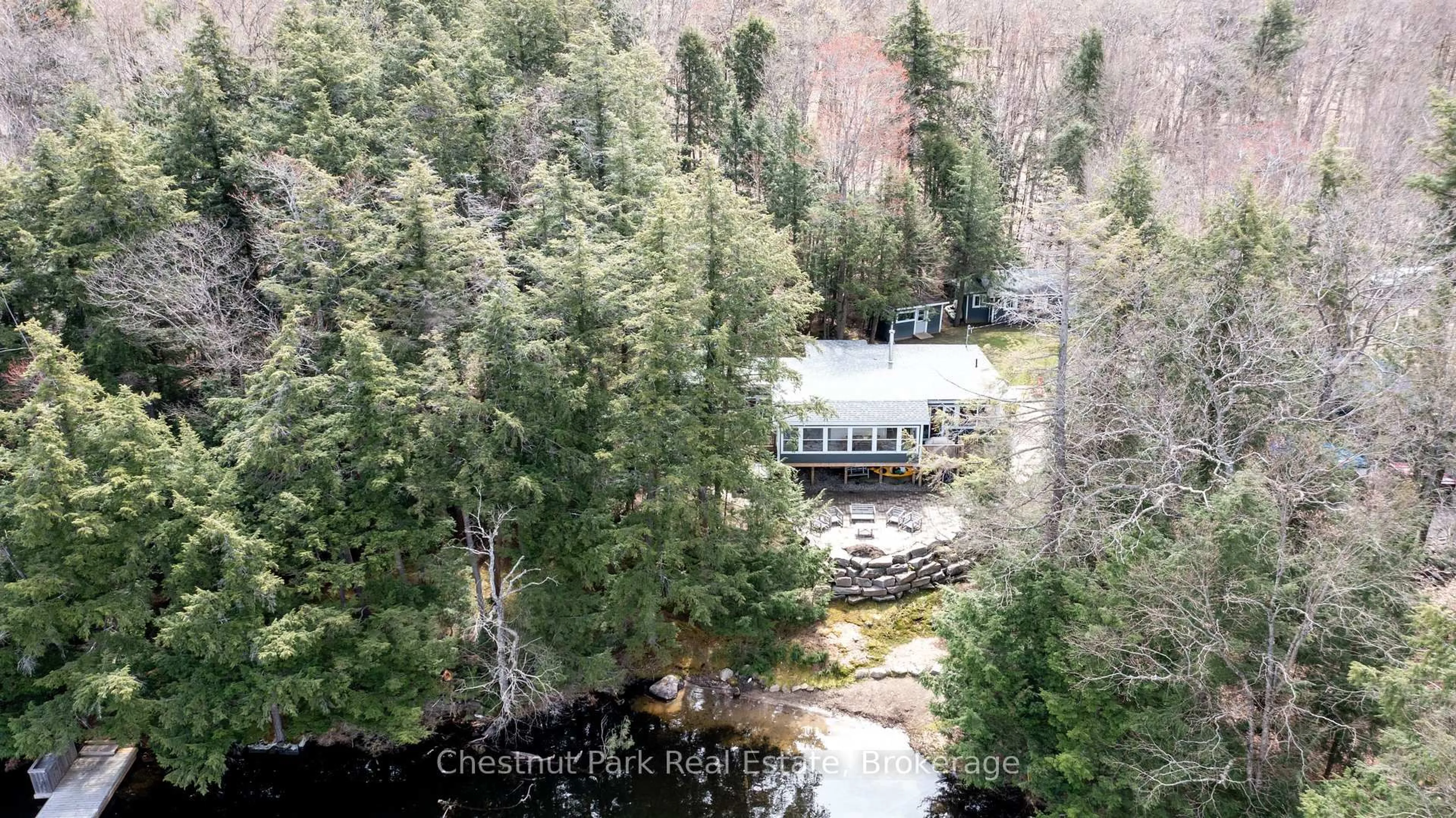 A pic from outside/outdoor area/front of a property/back of a property/a pic from drone, forest/trees view for 1058 Sands Rd #10, Muskoka Lakes Ontario P0B 0A4