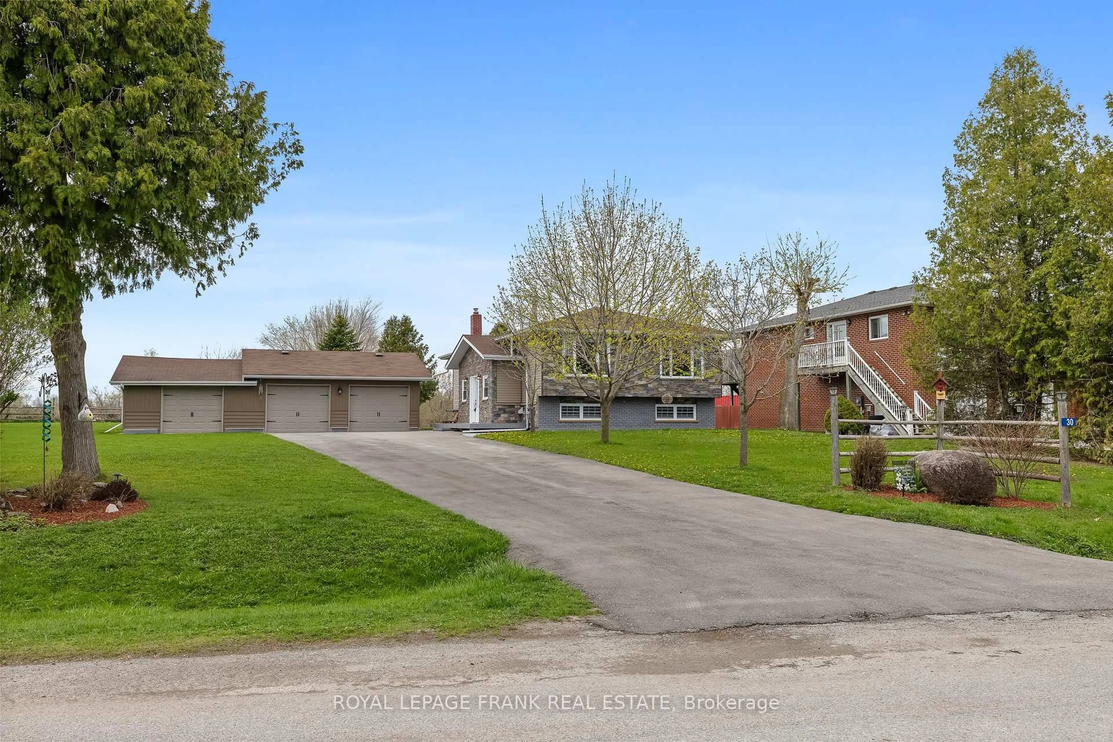A pic from outside/outdoor area/front of a property/back of a property/a pic from drone, street for 30 Druan Dr, Kawartha Lakes Ontario L9L 1B6