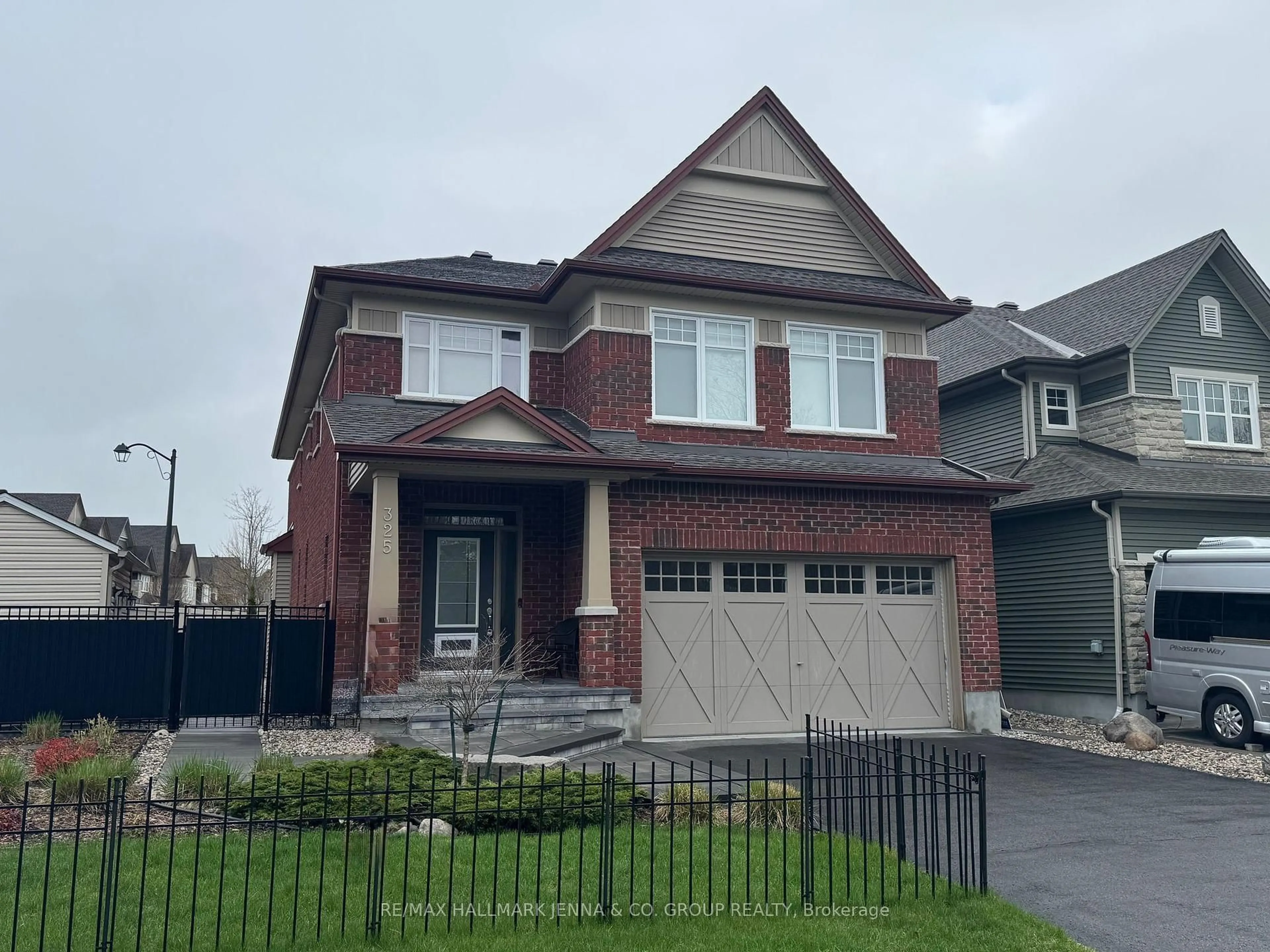 Home with brick exterior material, street for 325 Via Verona Ave, Ottawa Ontario K2J 5X9