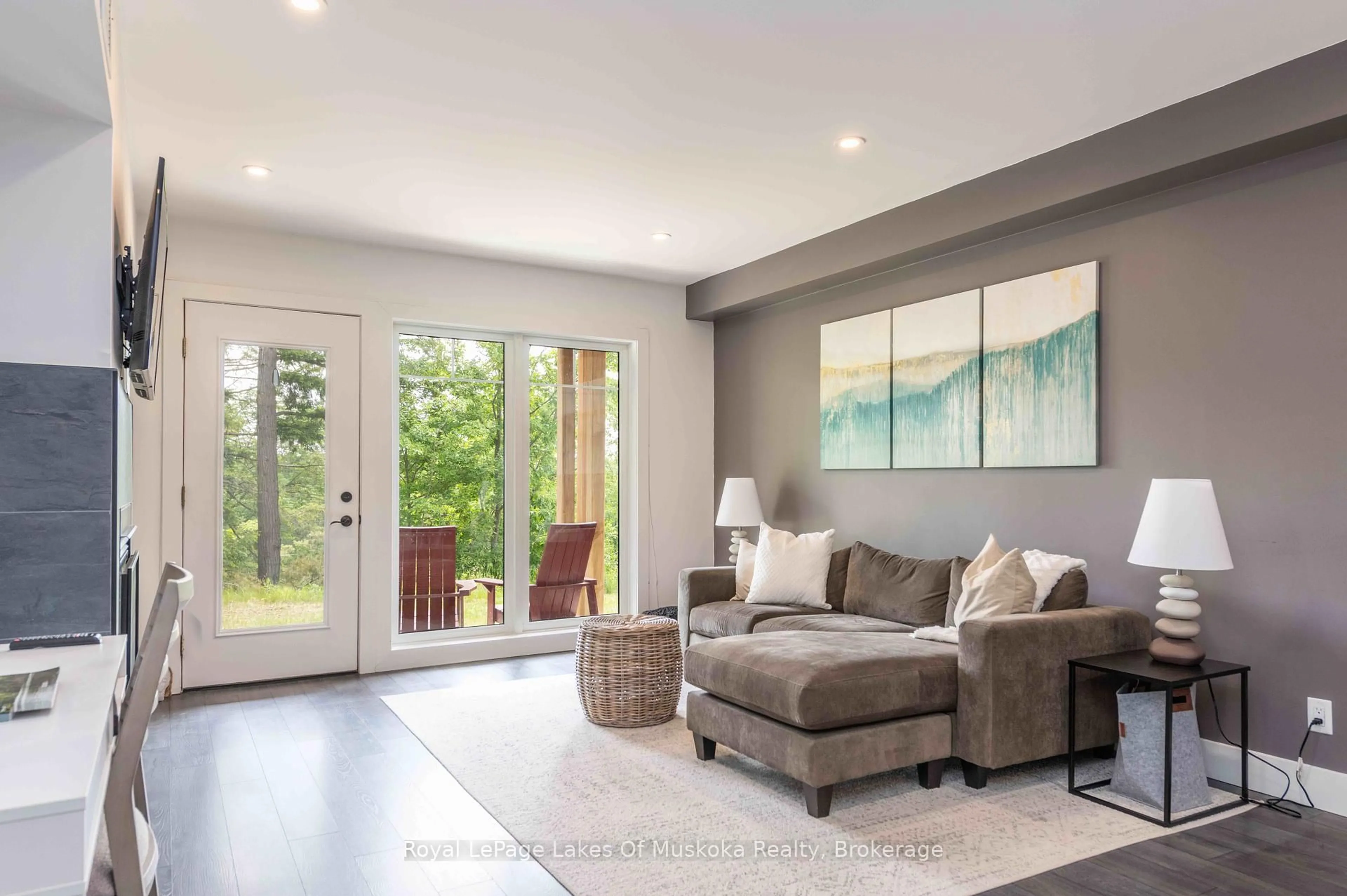 Living room with furniture, unknown for 3 TREE TOPS Lane #102, Huntsville Ontario P1H 0B8