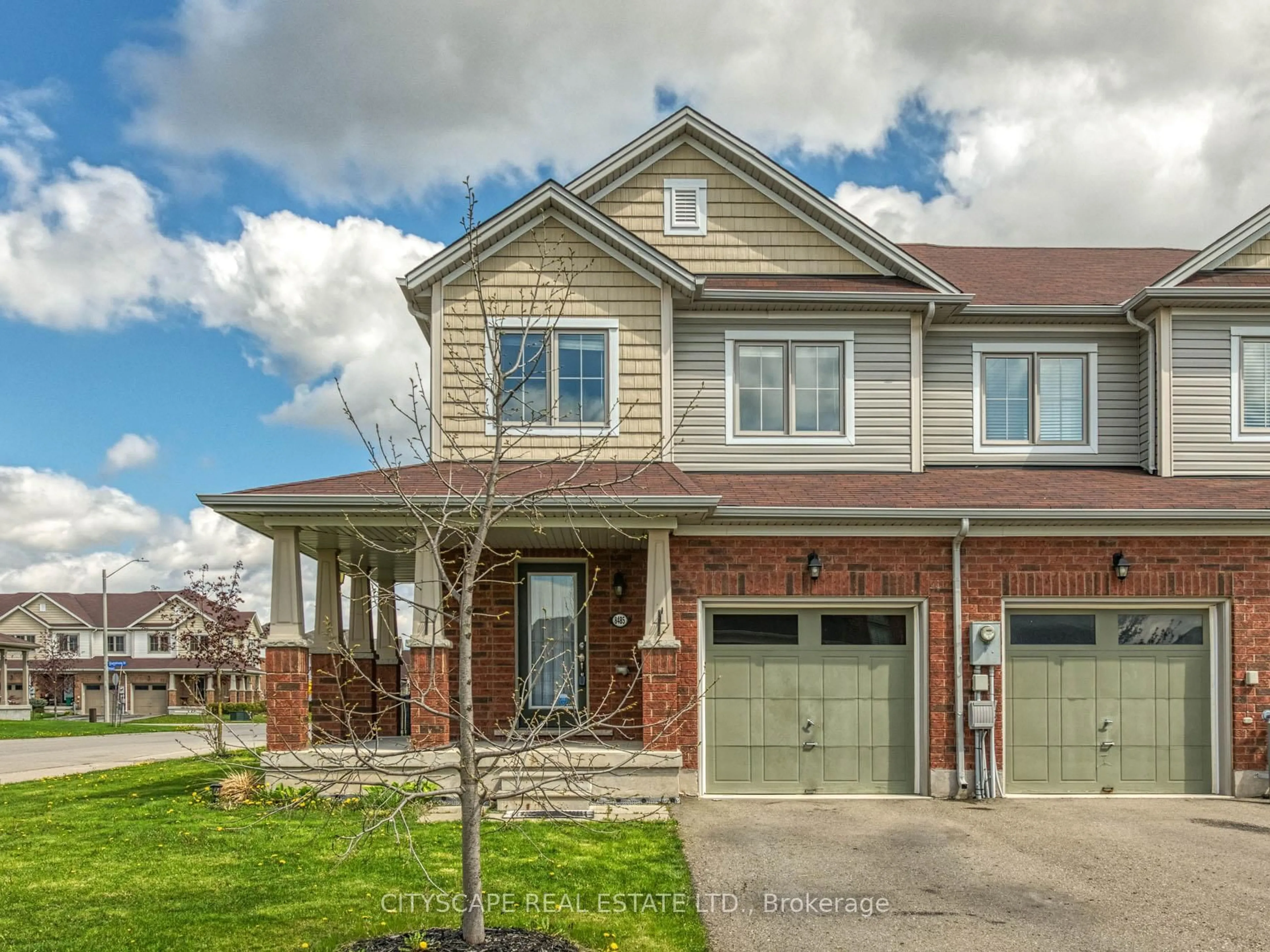 Home with brick exterior material, street for 8485 Primrose Lane, Niagara Falls Ontario L2H 0K8