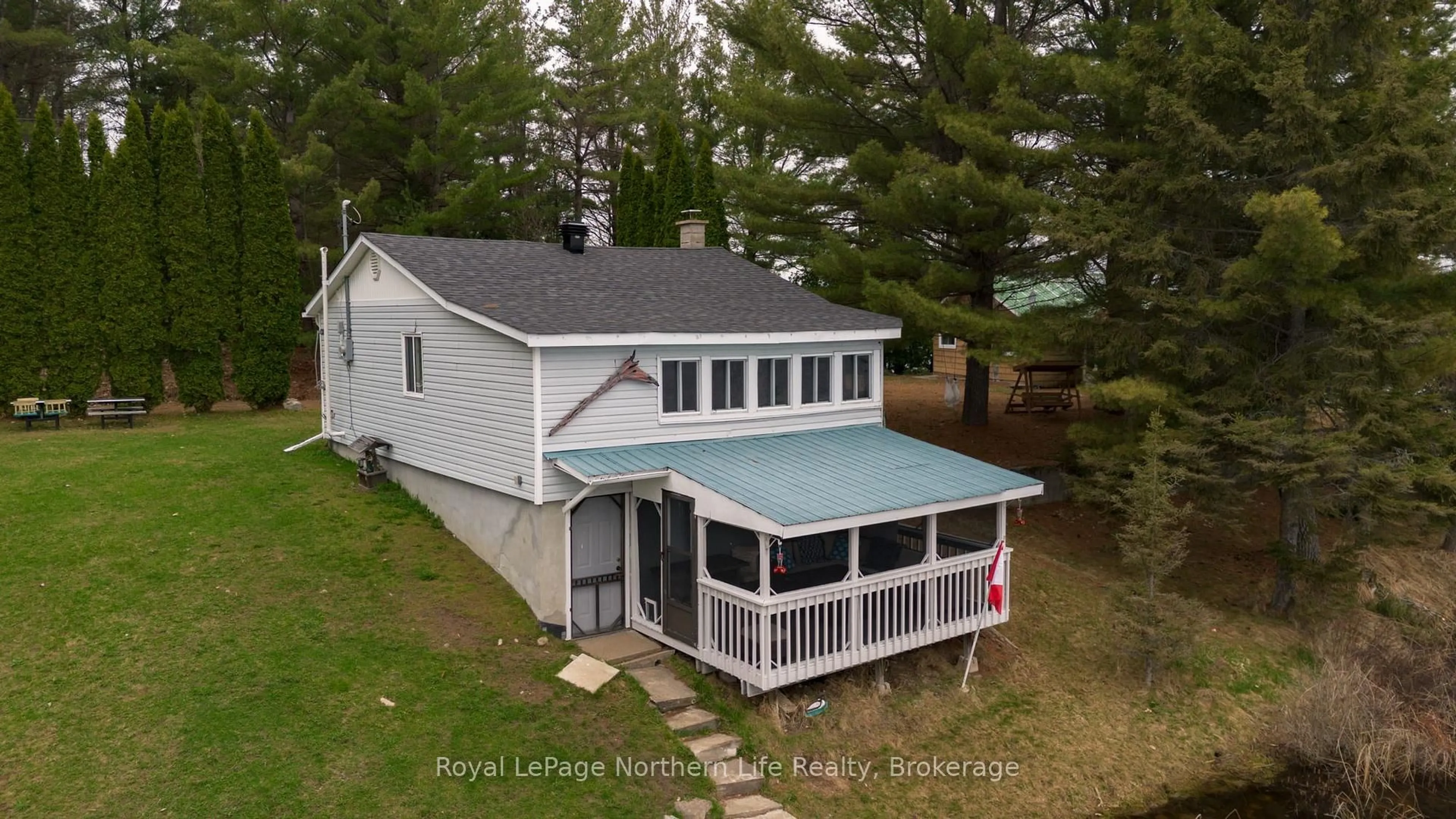 A pic from outside/outdoor area/front of a property/back of a property/a pic from drone, unknown for 45 Lionel Rd, West Nipissing Ontario P0H 2M0
