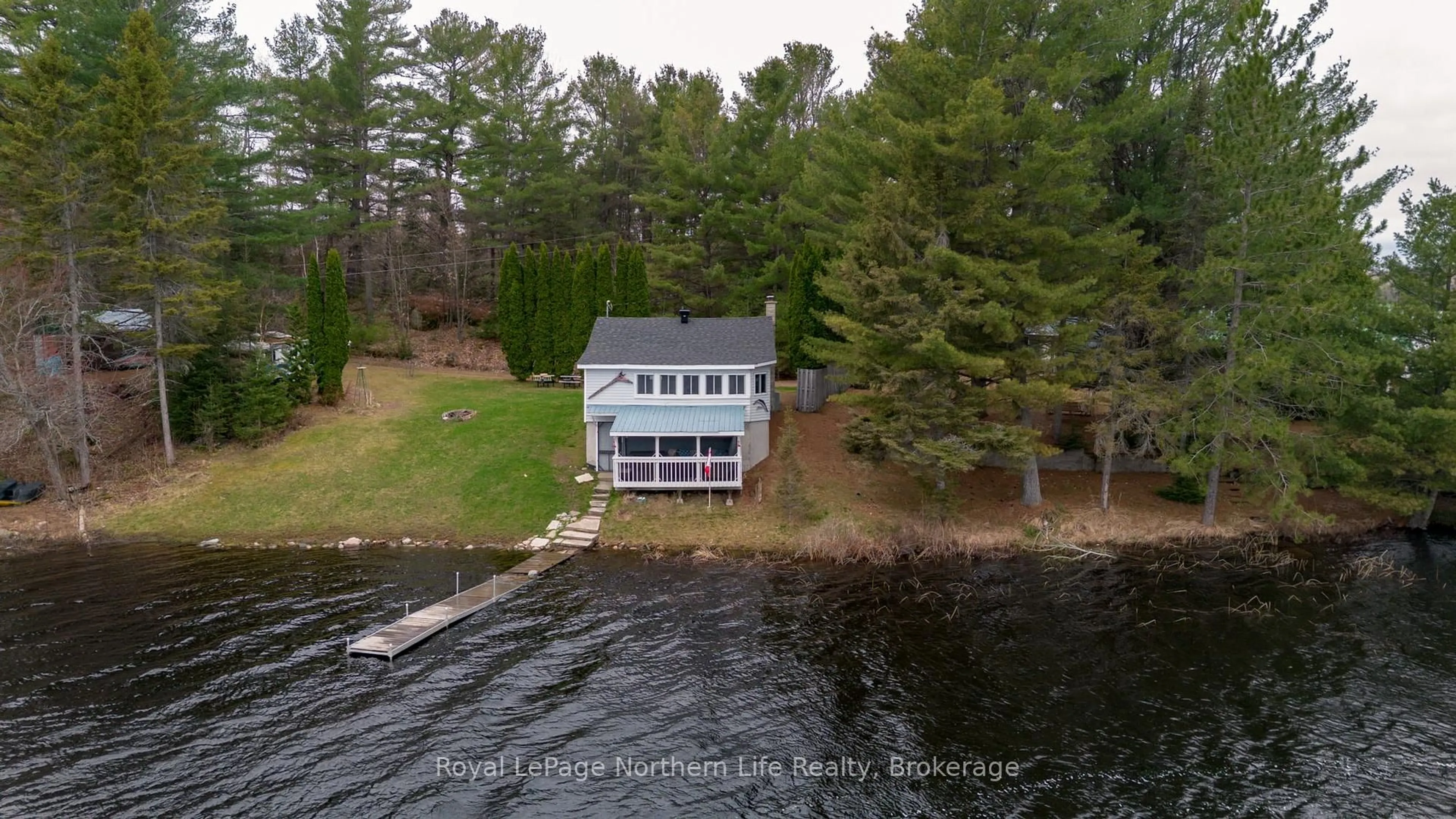 A pic from outside/outdoor area/front of a property/back of a property/a pic from drone, water/lake/river/ocean view for 45 Lionel Rd, West Nipissing Ontario P0H 2M0
