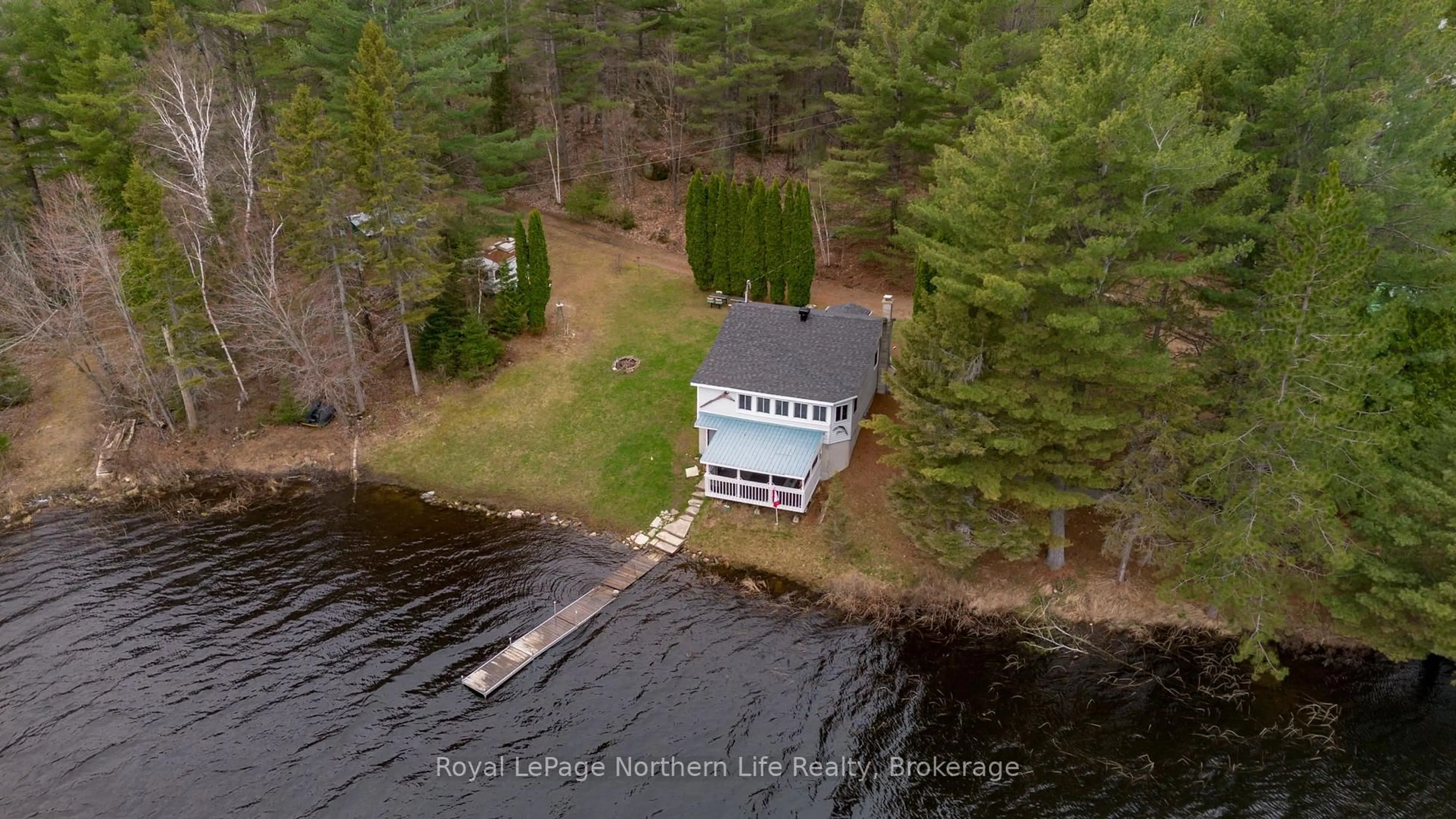 A pic from outside/outdoor area/front of a property/back of a property/a pic from drone, water/lake/river/ocean view for 45 Lionel Rd, West Nipissing Ontario P0H 2M0