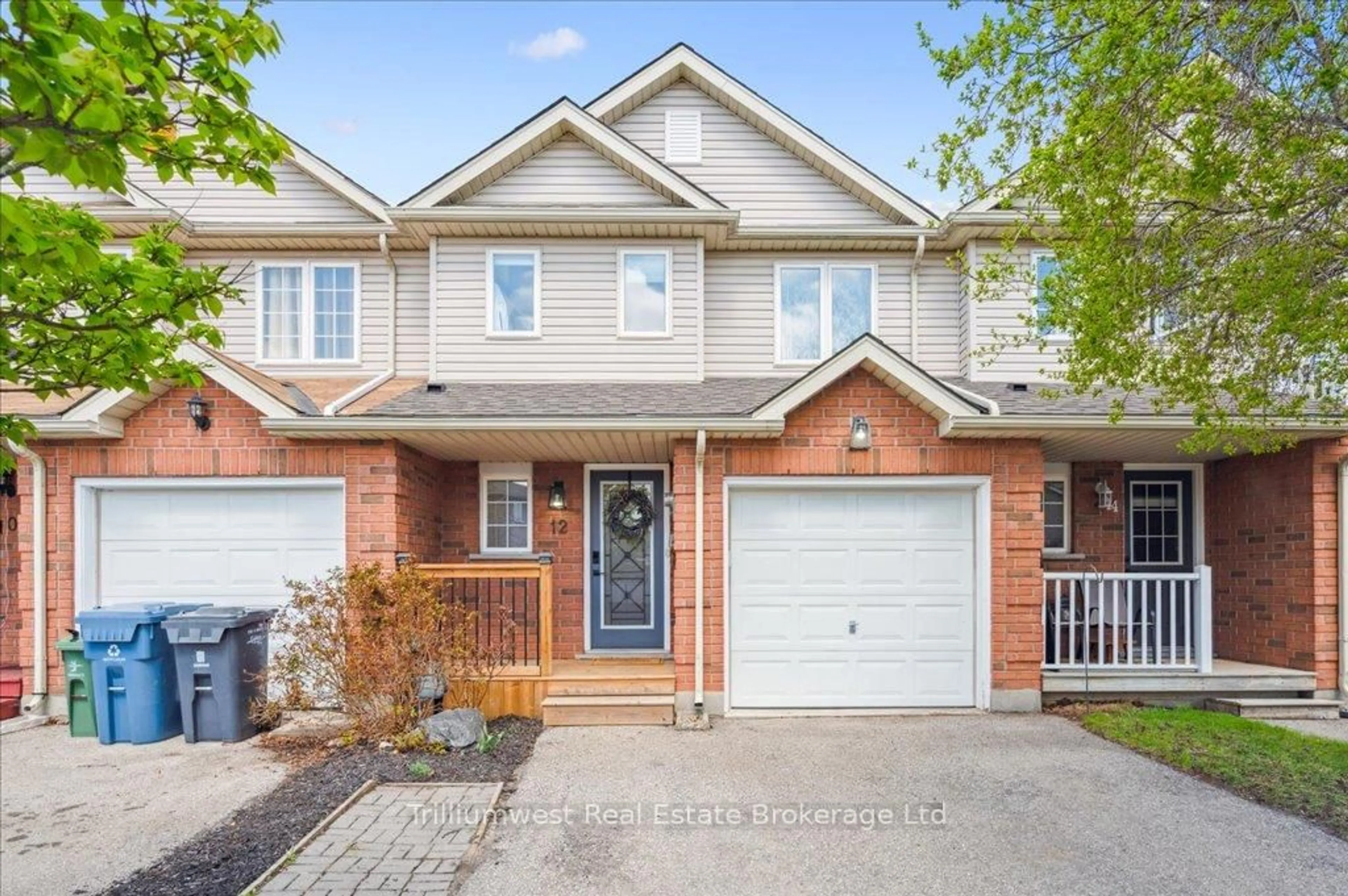 Home with brick exterior material, street for 12 Sullivan Cres, Guelph Ontario N1K 1X8