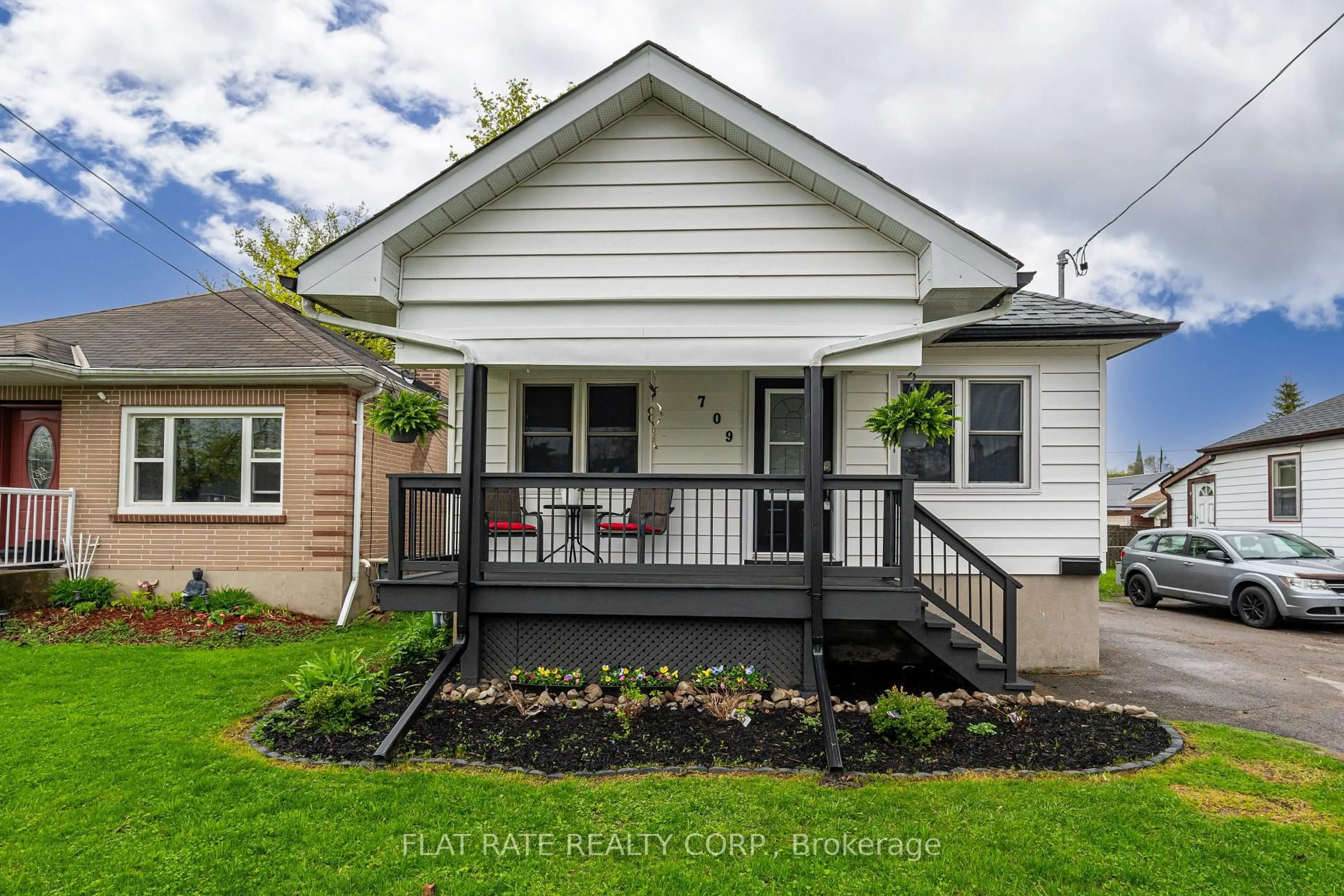 Home with vinyl exterior material, street for 709 YOUNG St, Peterborough Ontario K9J 3A3