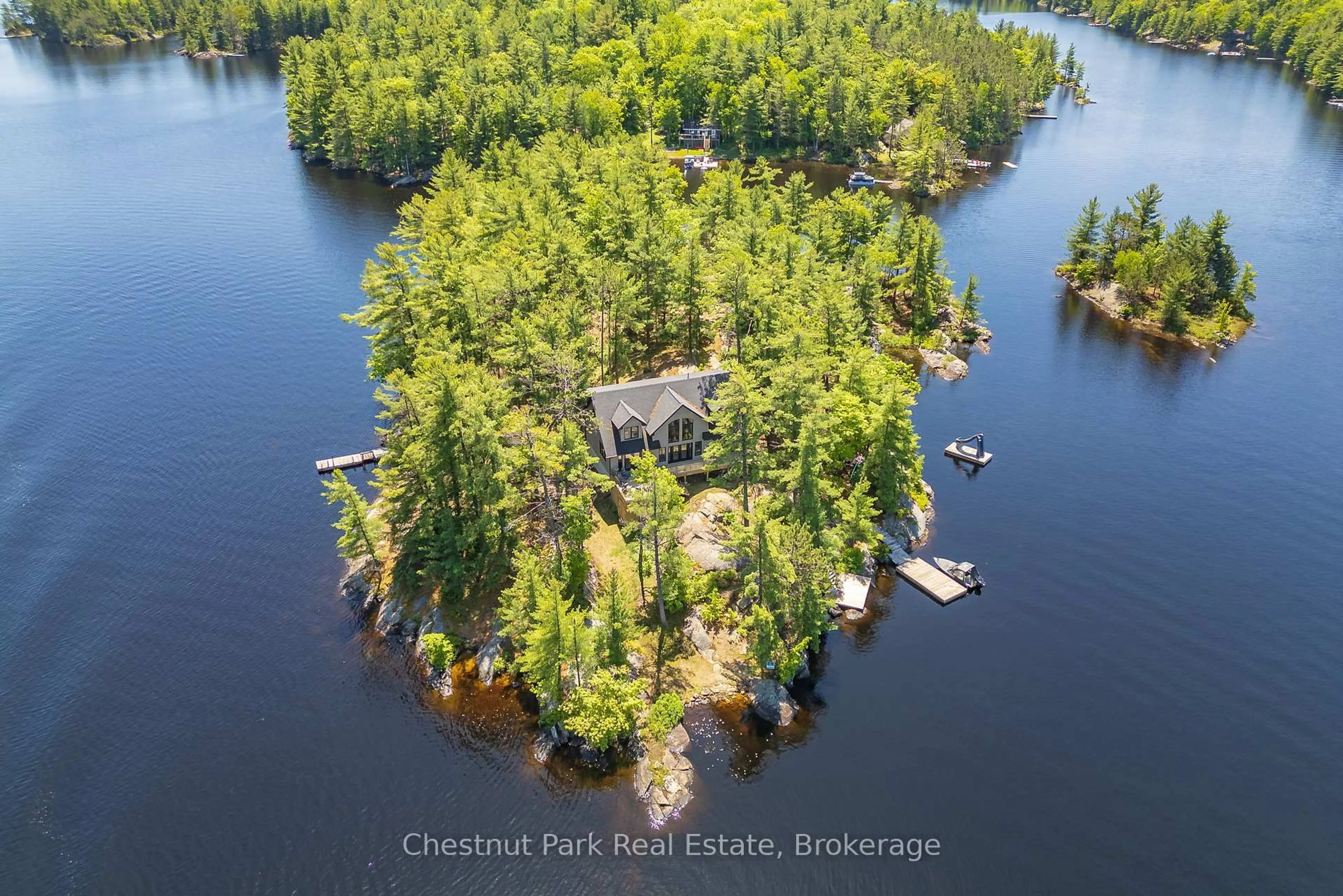 A pic from outside/outdoor area/front of a property/back of a property/a pic from drone, water/lake/river/ocean view for 1 NINE MILE ISLAND N/A, Muskoka Lakes Ontario P0C 1M0