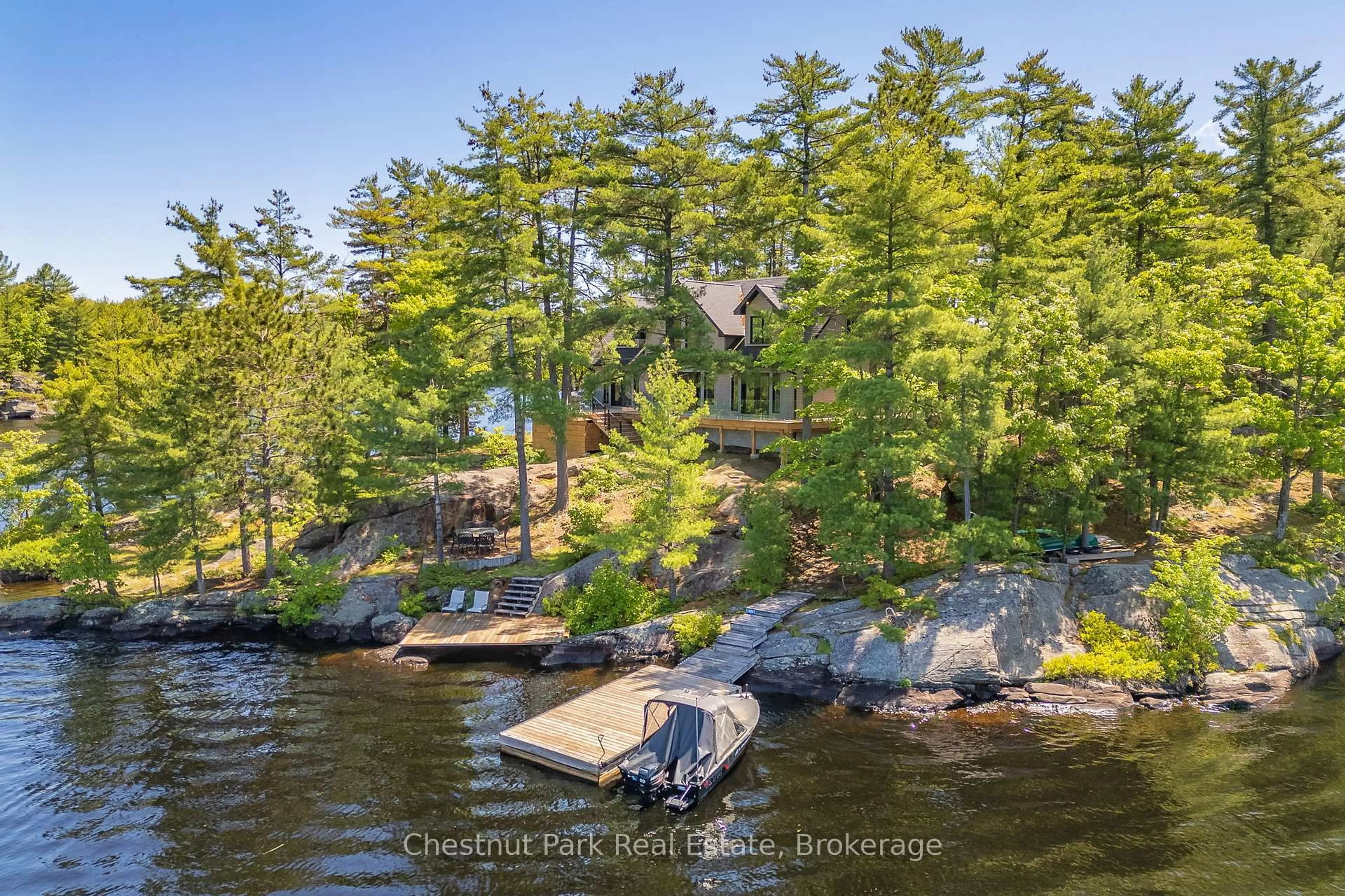 A pic from outside/outdoor area/front of a property/back of a property/a pic from drone, water/lake/river/ocean view for 1 NINE MILE ISLAND N/A, Muskoka Lakes Ontario P0C 1M0