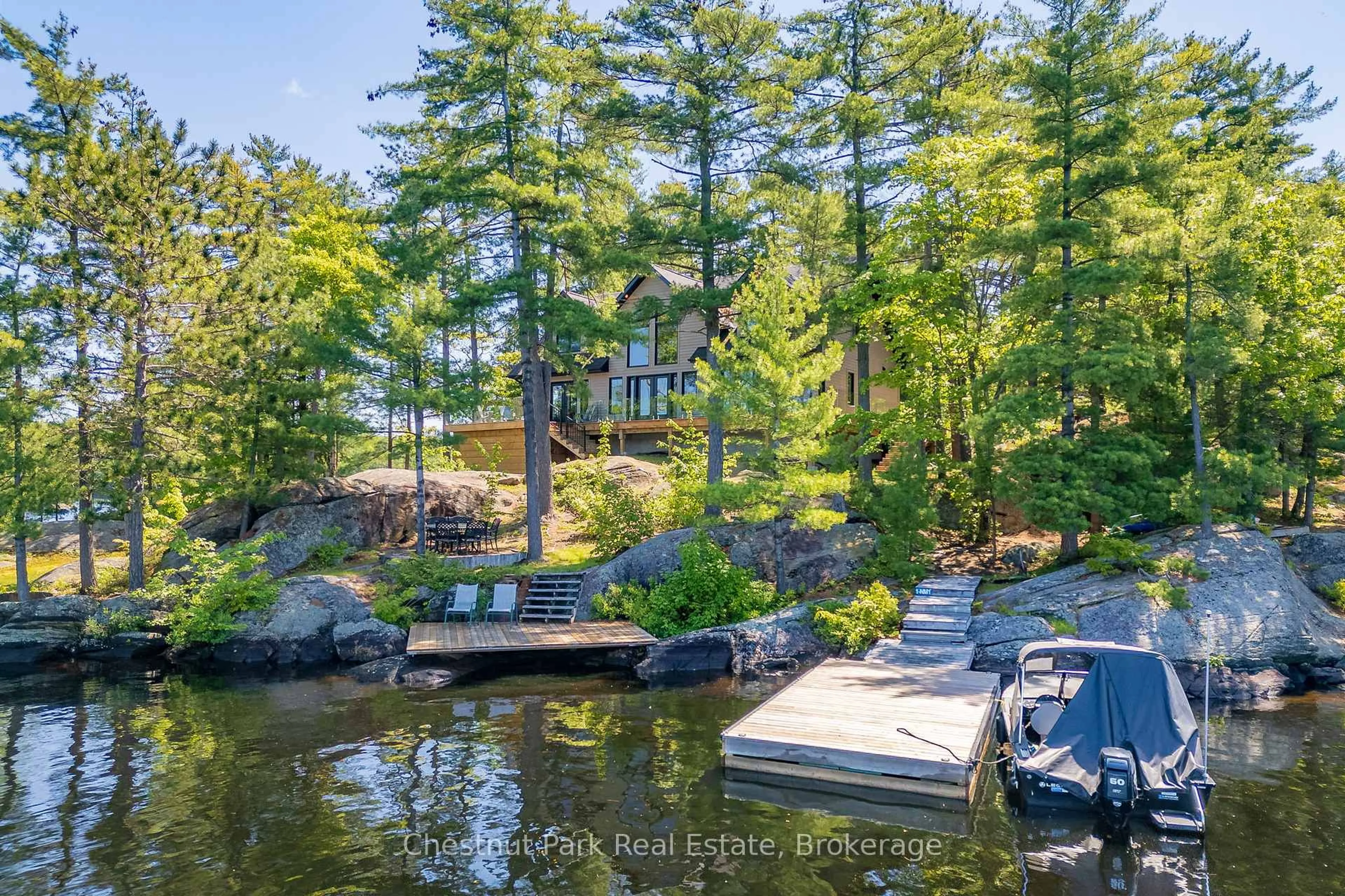 A pic from outside/outdoor area/front of a property/back of a property/a pic from drone, water/lake/river/ocean view for 1 NINE MILE ISLAND N/A, Muskoka Lakes Ontario P0C 1M0