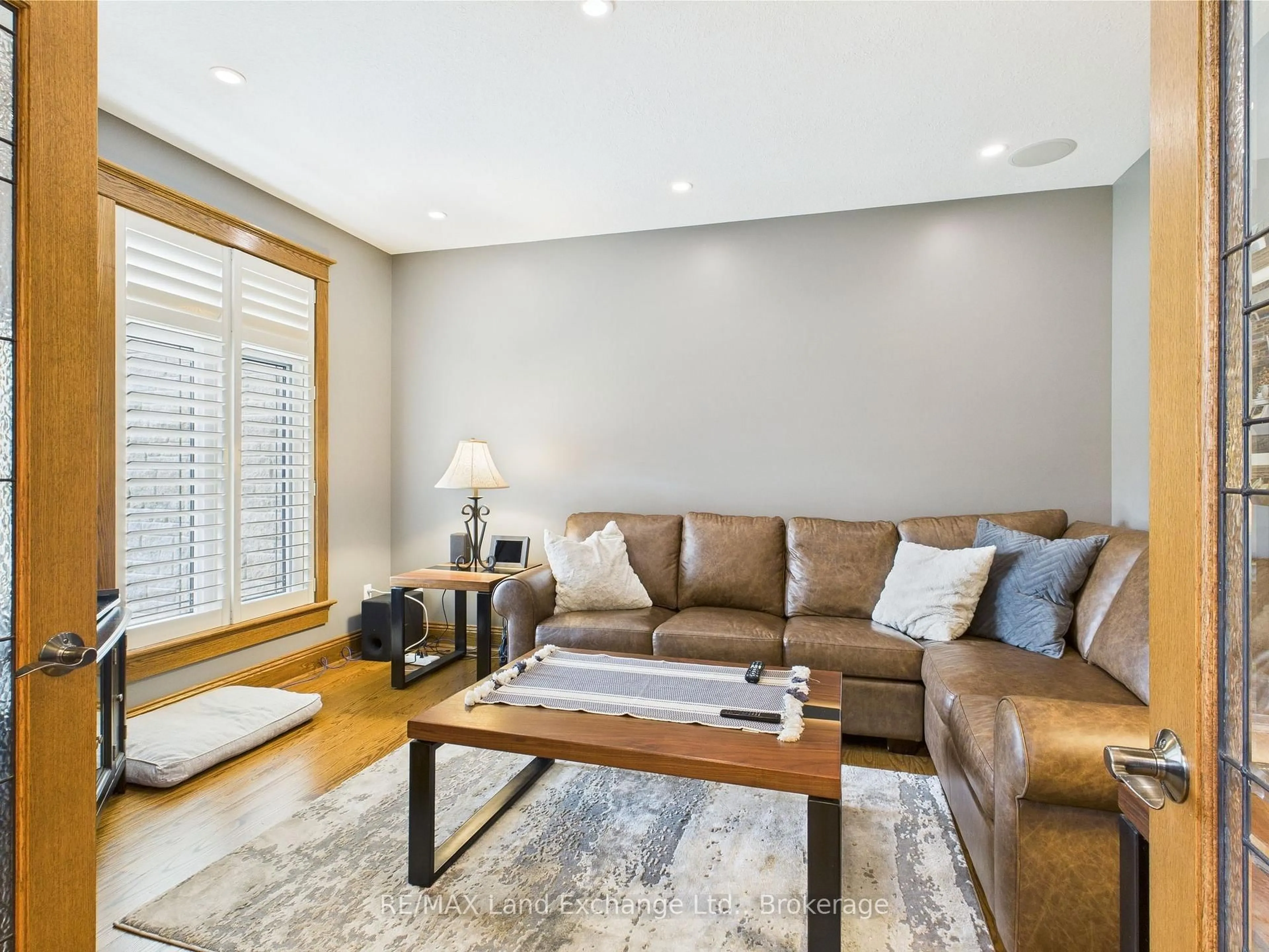 Living room with furniture, wood/laminate floor for 195 Birchwood Ave, Kincardine Ontario N0G 2T0