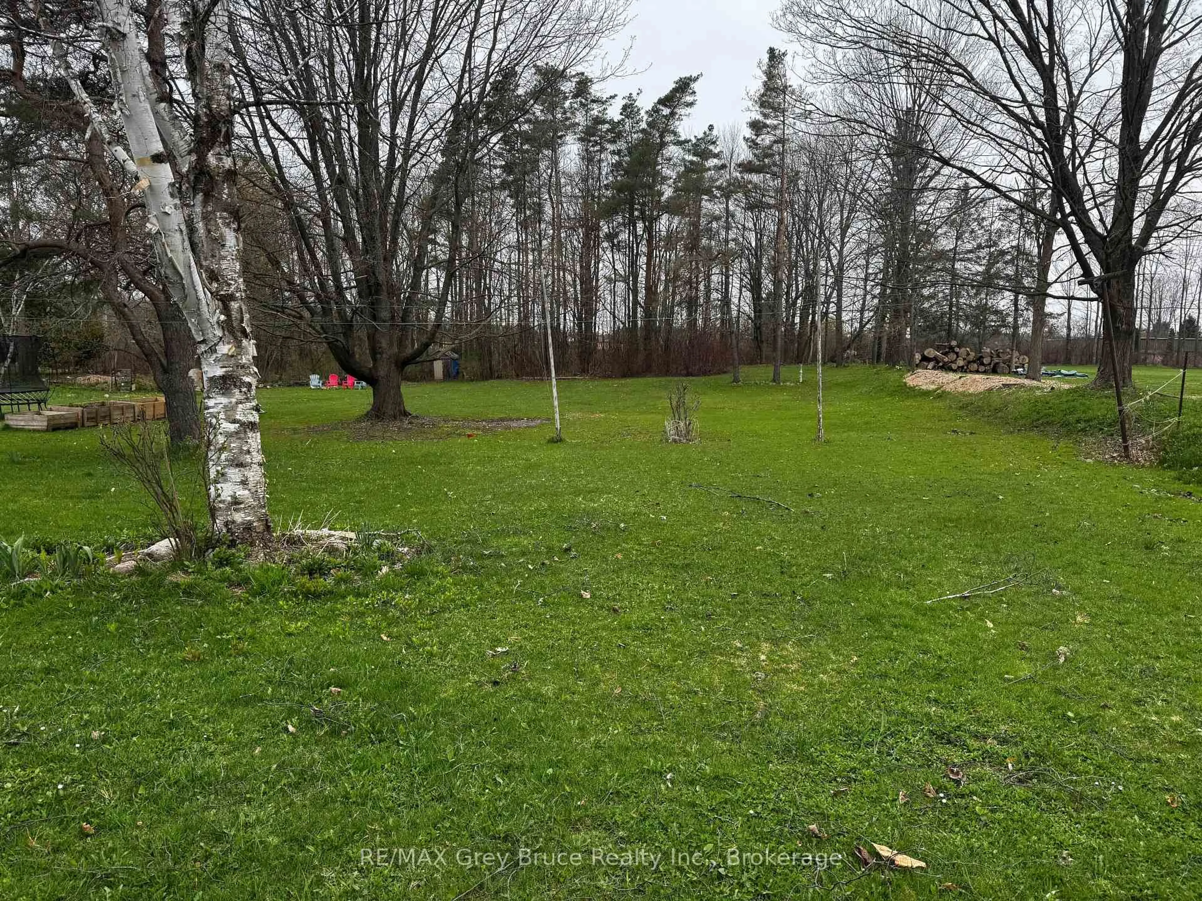 A pic from outside/outdoor area/front of a property/back of a property/a pic from drone, forest/trees view for 2496 6th Ave, Owen Sound Ontario N4K 5J6