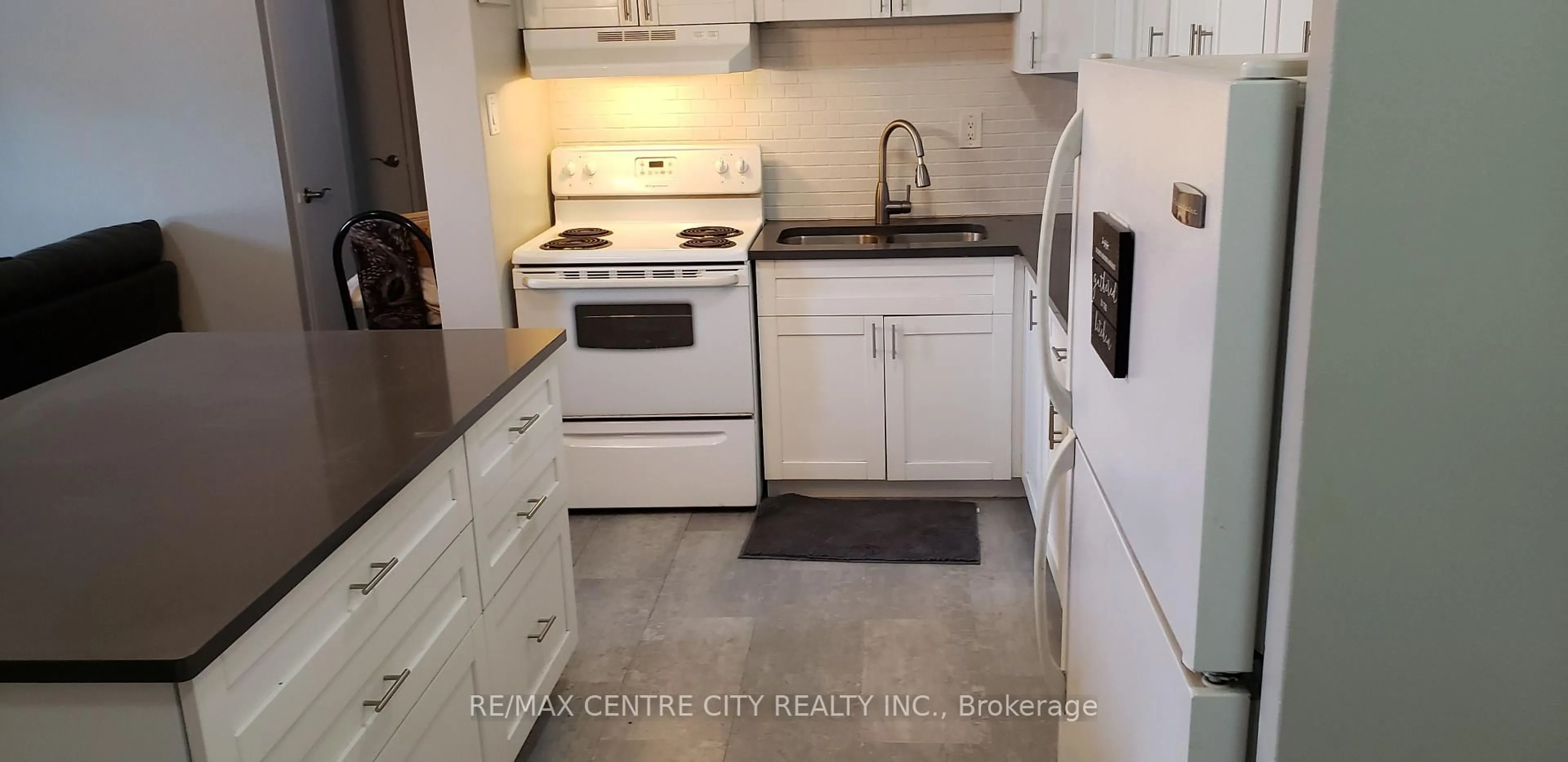 Standard kitchen, ceramic/tile floor for 563 Mornington Ave #704, London East Ontario N5Y 4T8
