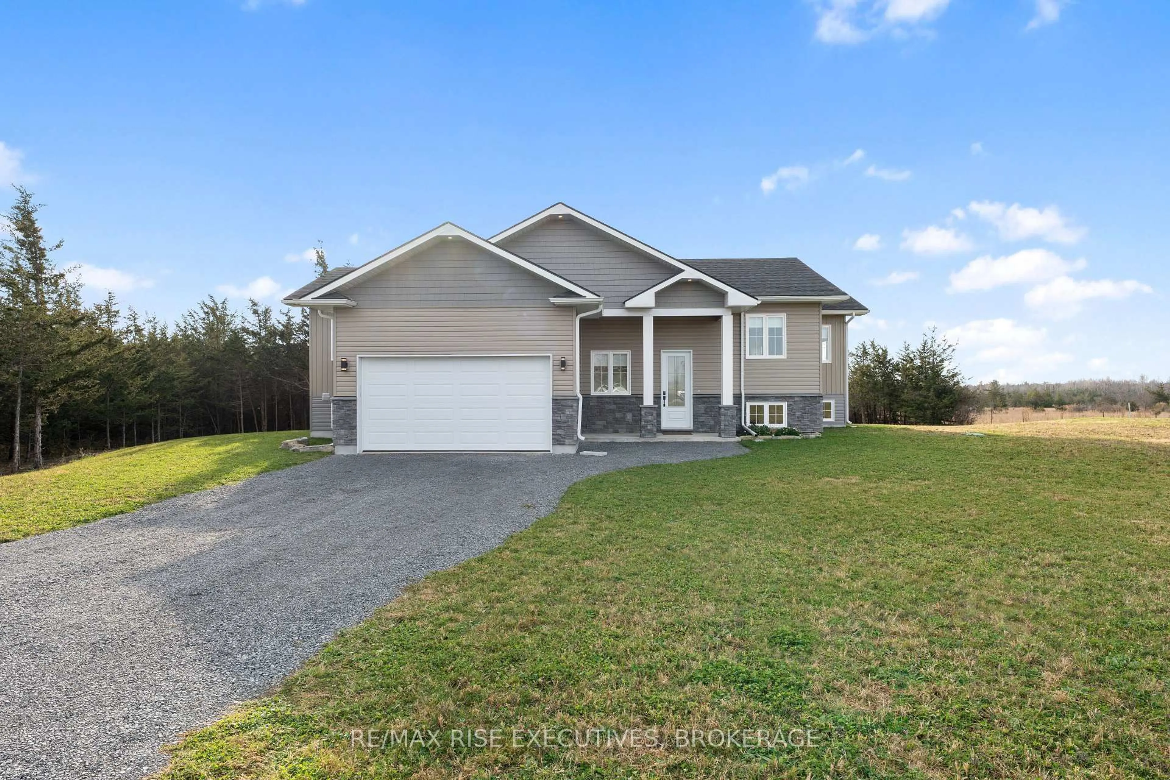 Home with vinyl exterior material, street for 781 Nugent Rd, Newburgh Ontario K0K 2S0