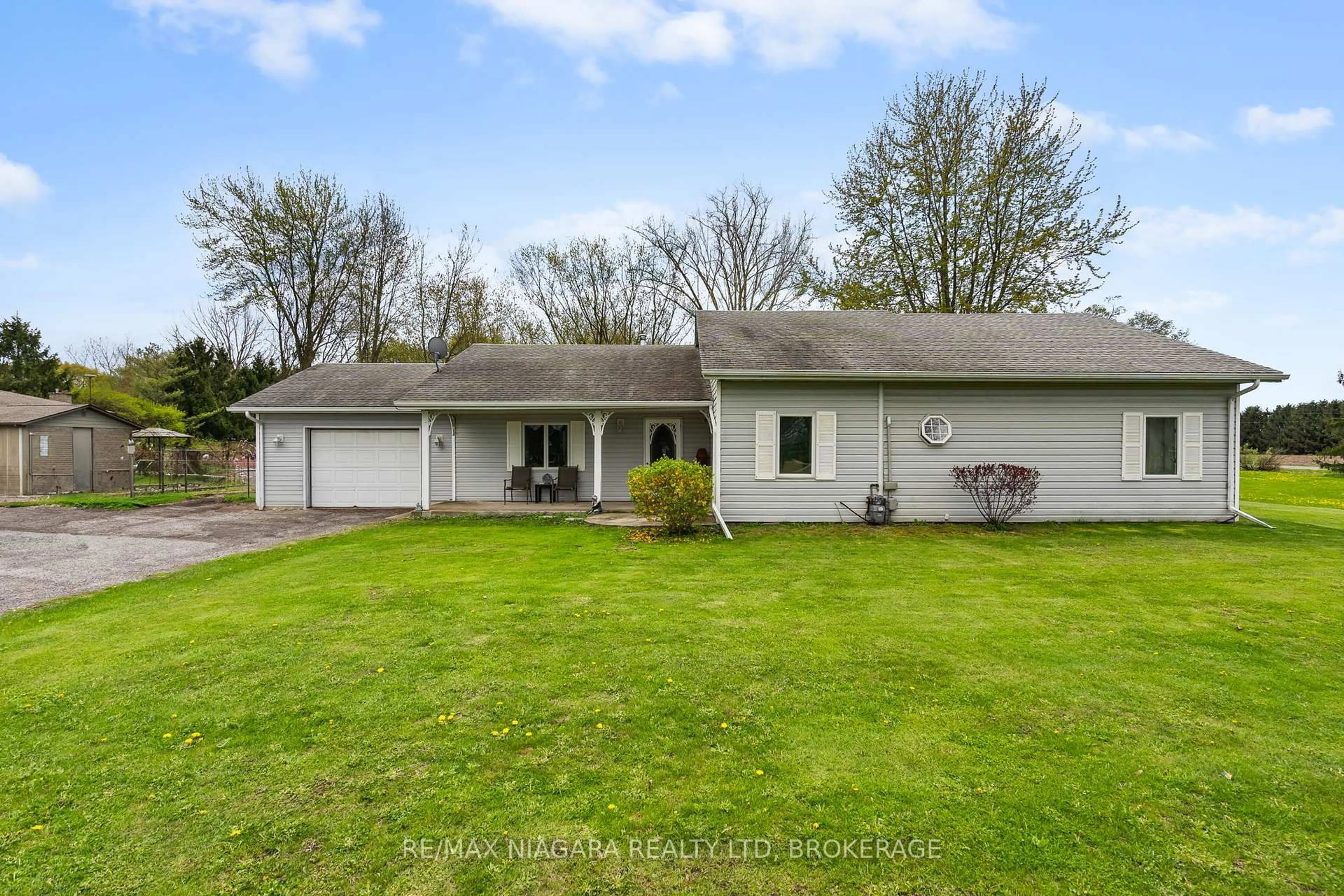 A pic from outside/outdoor area/front of a property/back of a property/a pic from drone, street for 42585 Hwy 3 Highway, Wainfleet Ontario L0S 1V0