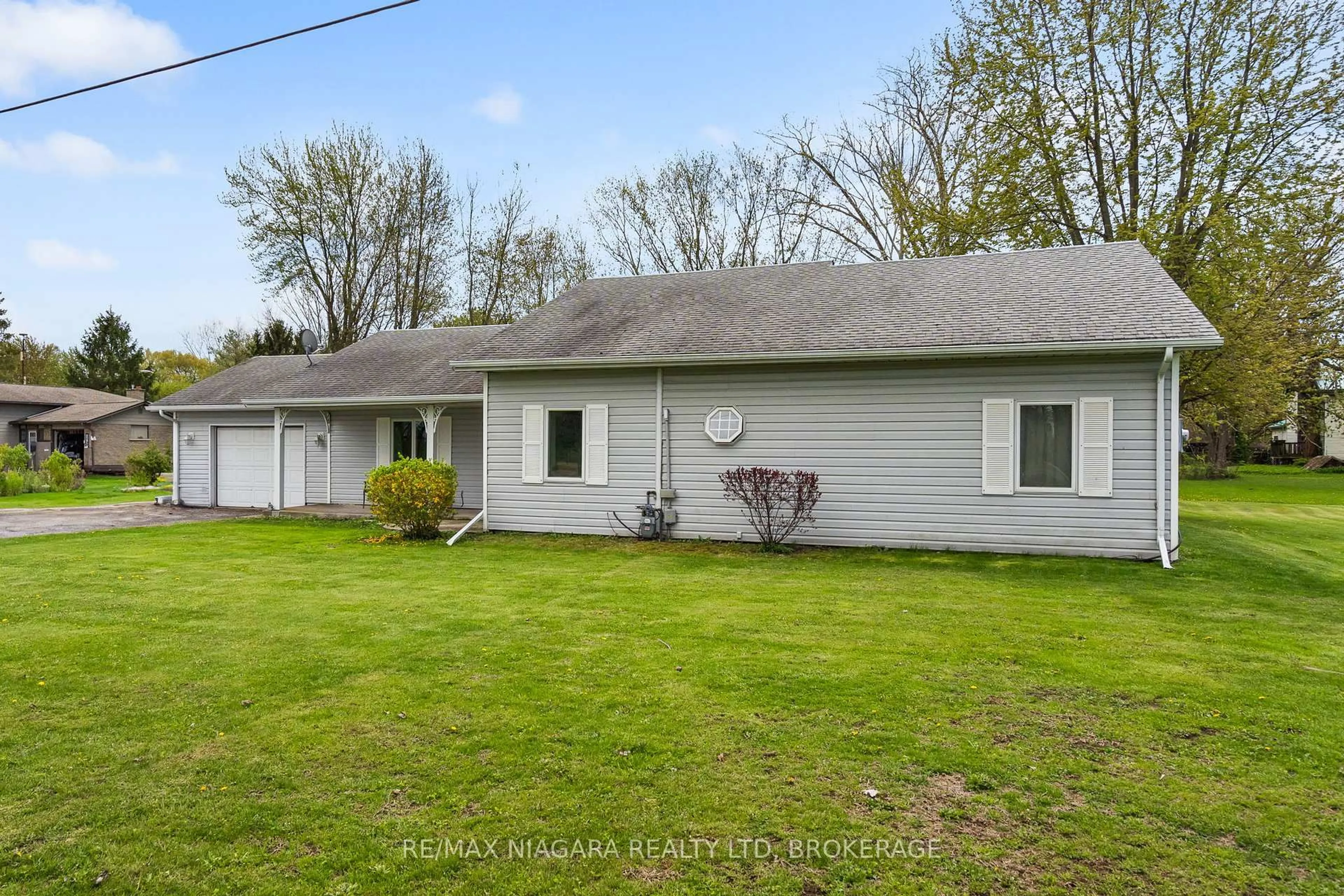 A pic from outside/outdoor area/front of a property/back of a property/a pic from drone, unknown for 42585 Hwy 3 Highway, Wainfleet Ontario L0S 1V0