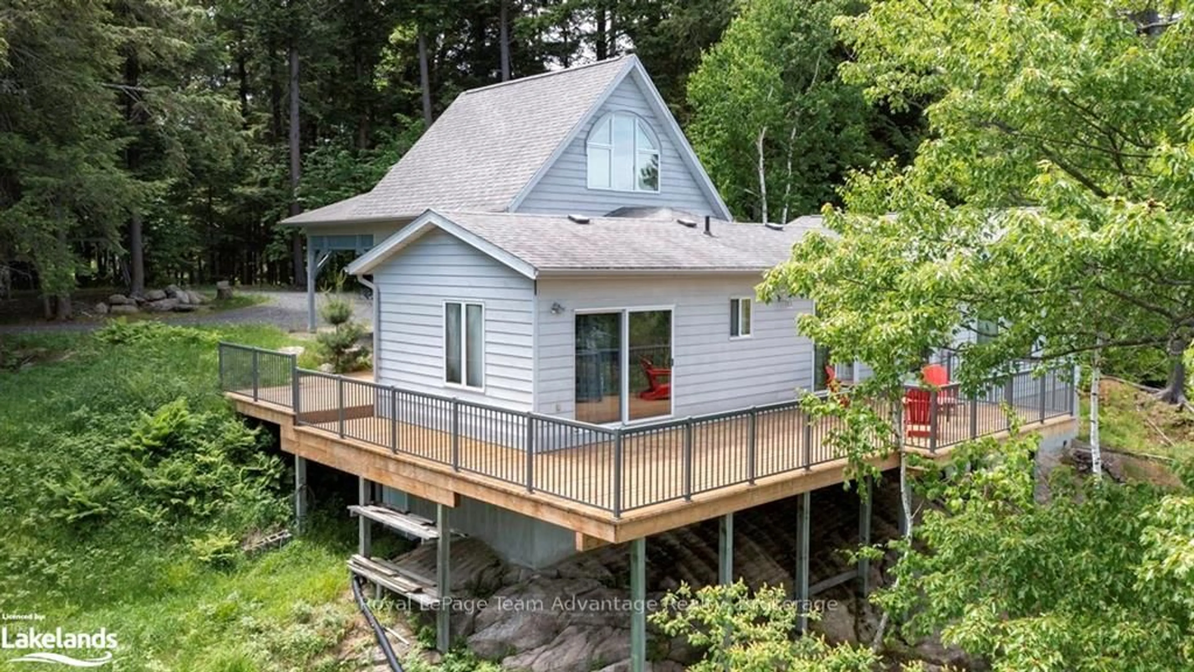 Home with vinyl exterior material, water/lake/river/ocean view for 5 Curran Tr, Carling Ontario P0G 1G0
