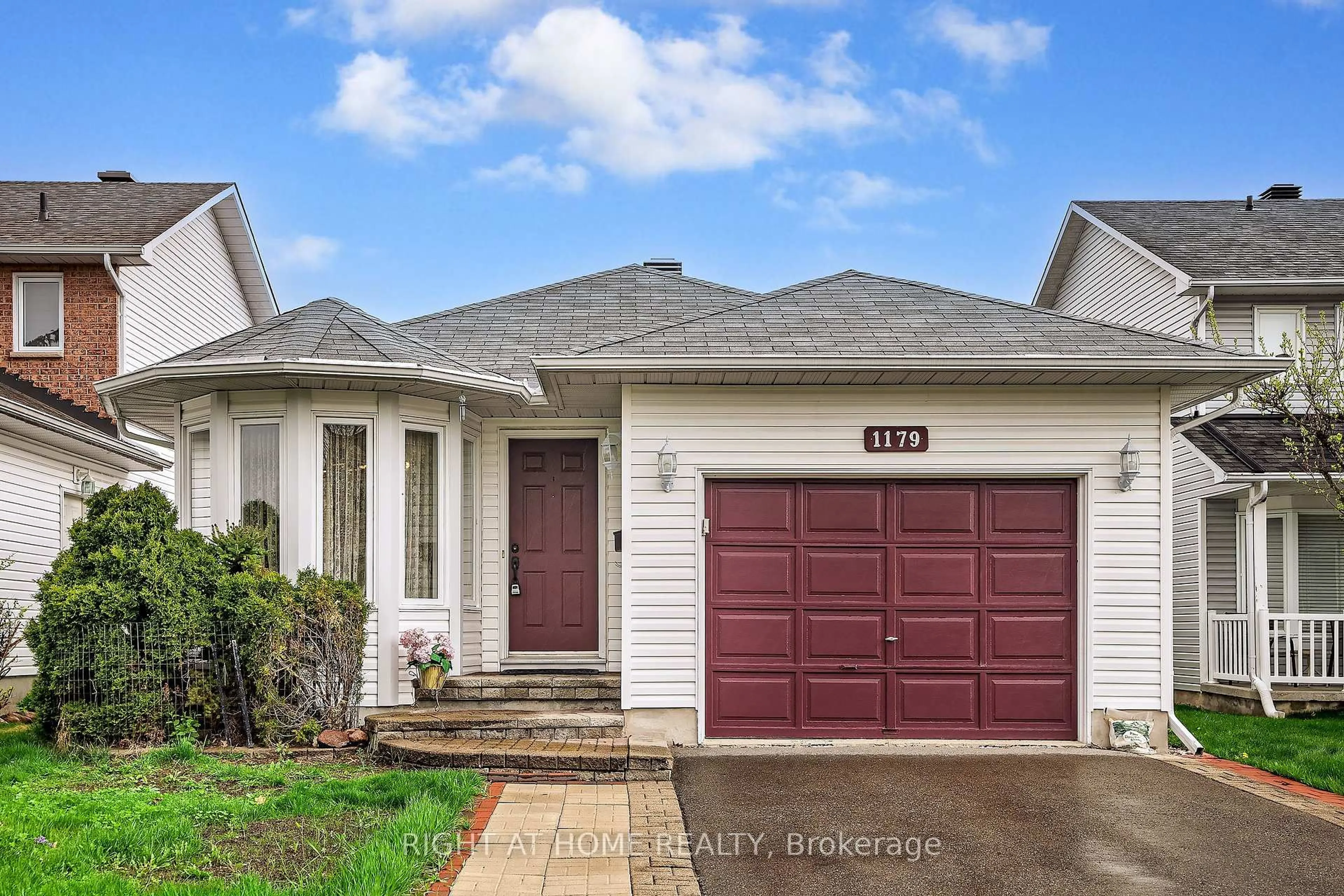 Home with vinyl exterior material, street for 1179 Whiterock St, Ottawa Ontario K1J 1B2