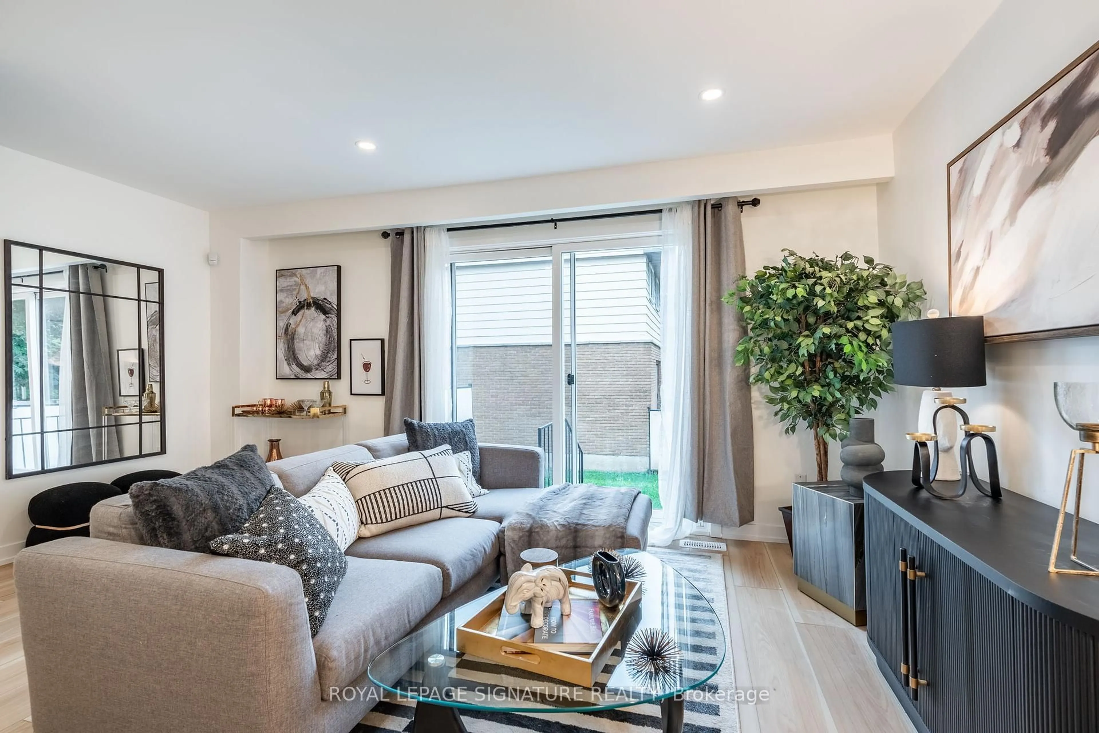 Living room with furniture, unknown for 28 Woodman Dr, Hamilton Ontario L8H 2M5