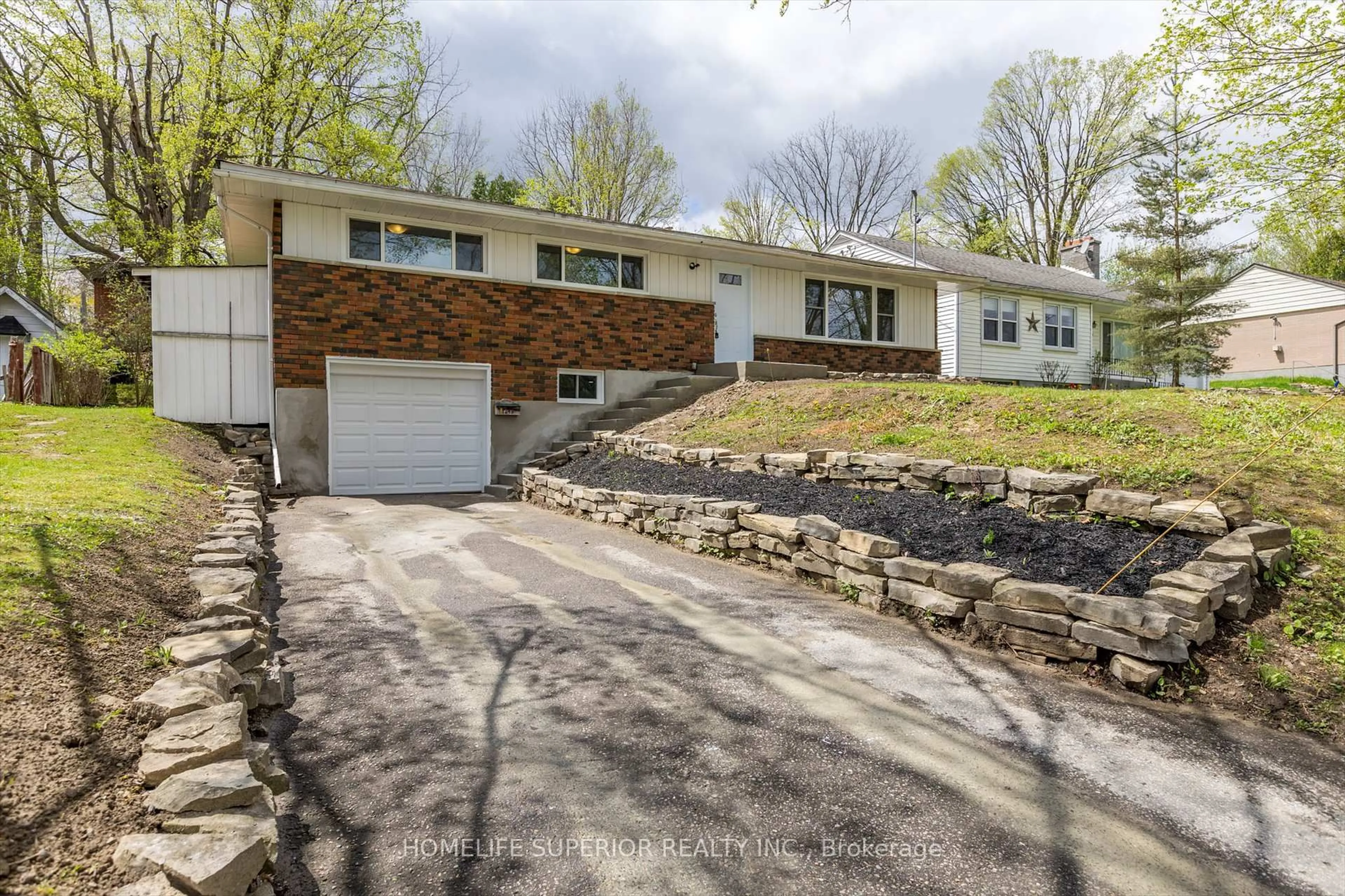 Home with brick exterior material, street for 1243 Albertus Ave, Peterborough Central Ontario K9J 6A3