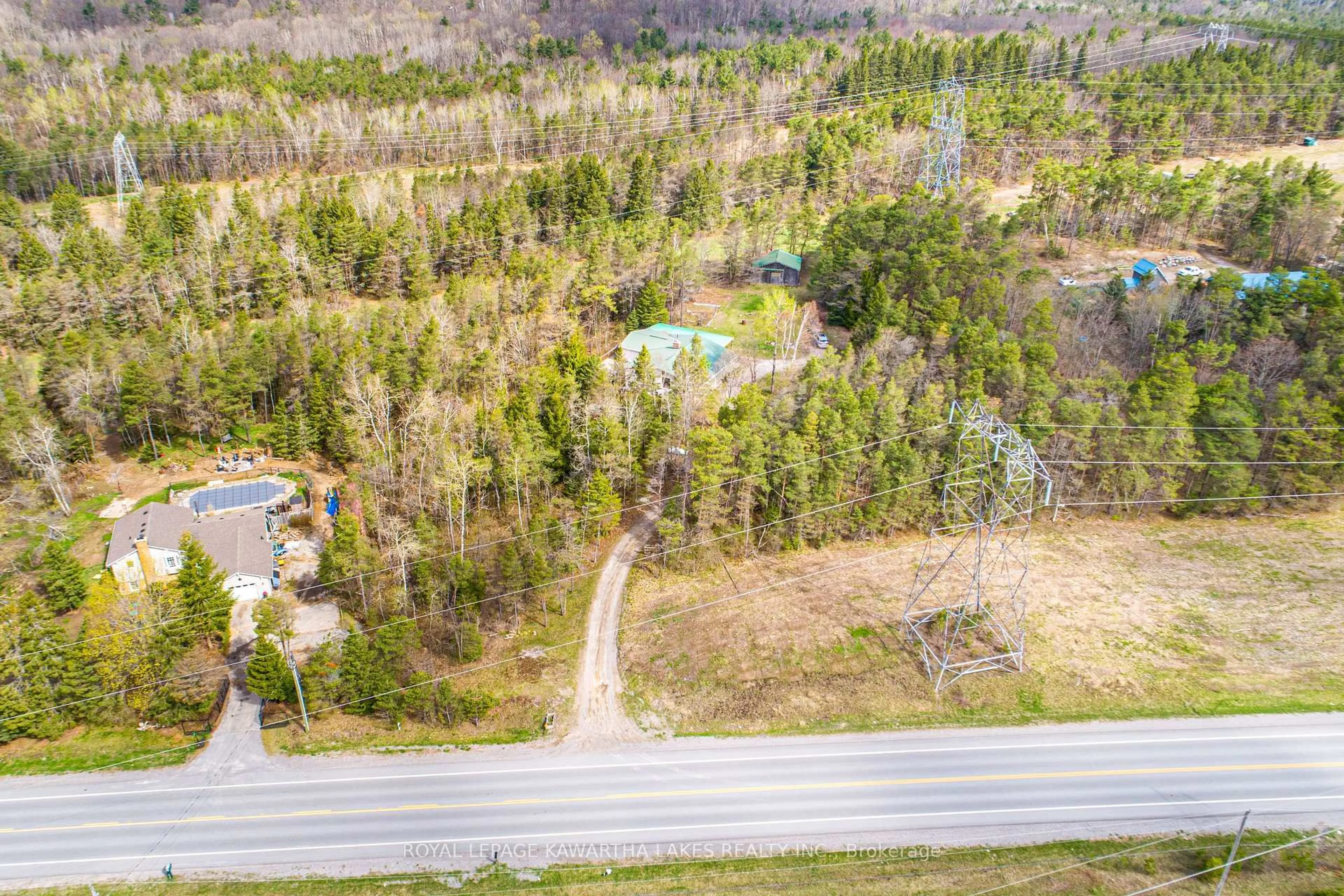 A pic from outside/outdoor area/front of a property/back of a property/a pic from drone, forest/trees view for 219 Pontypool Rd, Kawartha Lakes Ontario L0A 1K0