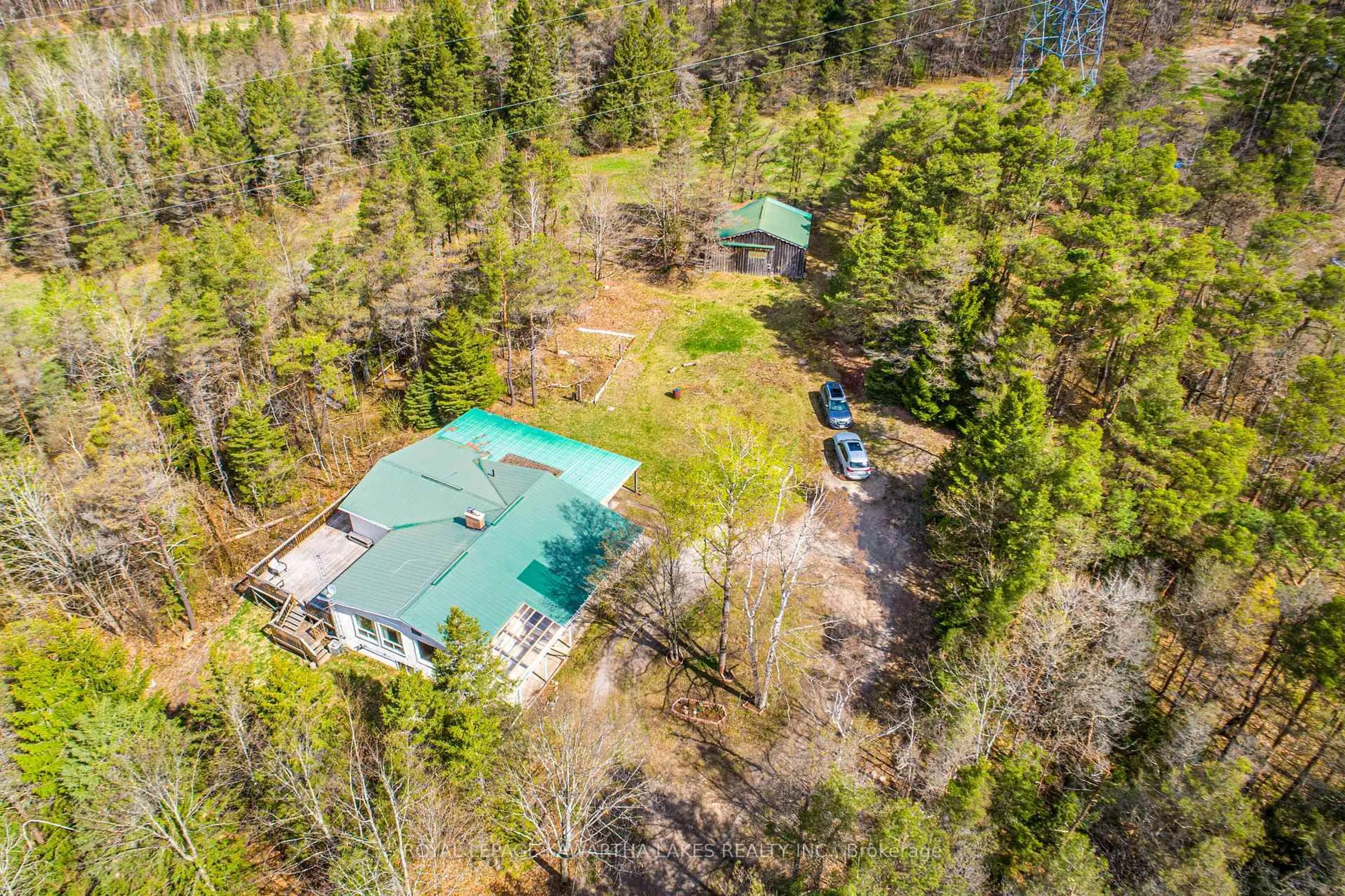 A pic from outside/outdoor area/front of a property/back of a property/a pic from drone, forest/trees view for 219 Pontypool Rd, Kawartha Lakes Ontario L0A 1K0
