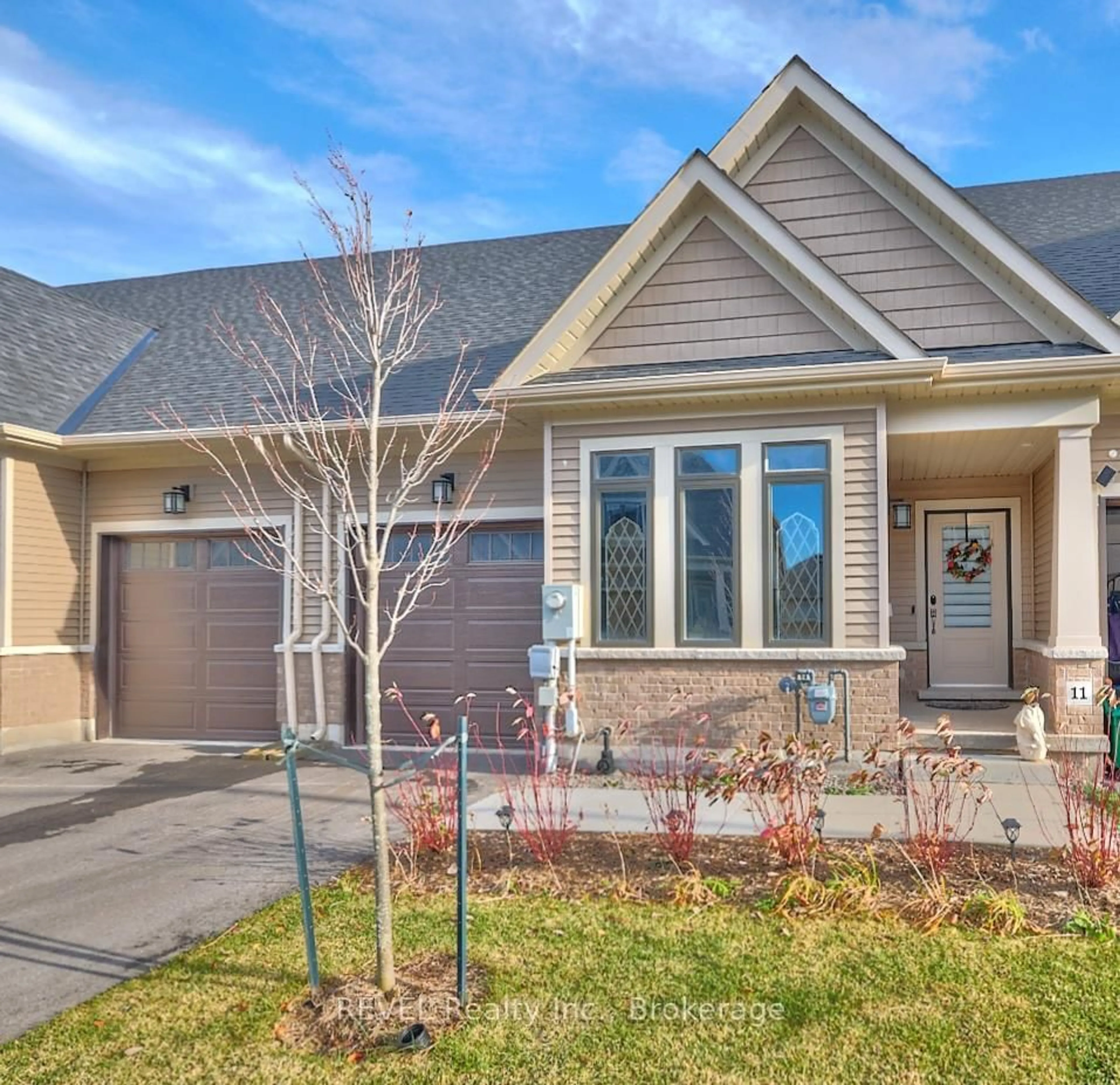 Home with vinyl exterior material, street for 4311 Mann St #11, Niagara Falls Ontario L2G 0E7