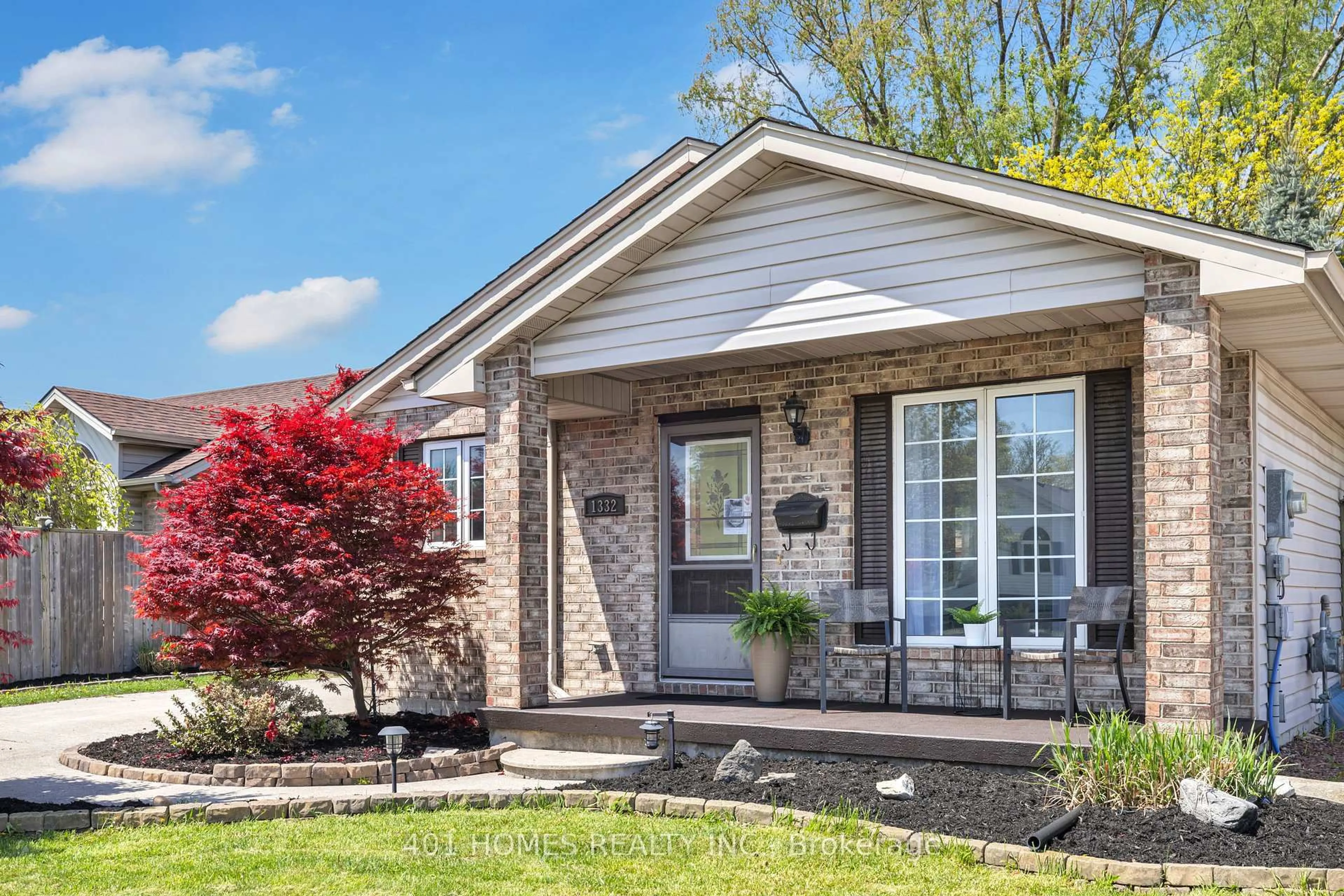 Home with brick exterior material, street for 1332 Hansen Cres, Windsor Ontario N8W 5M8