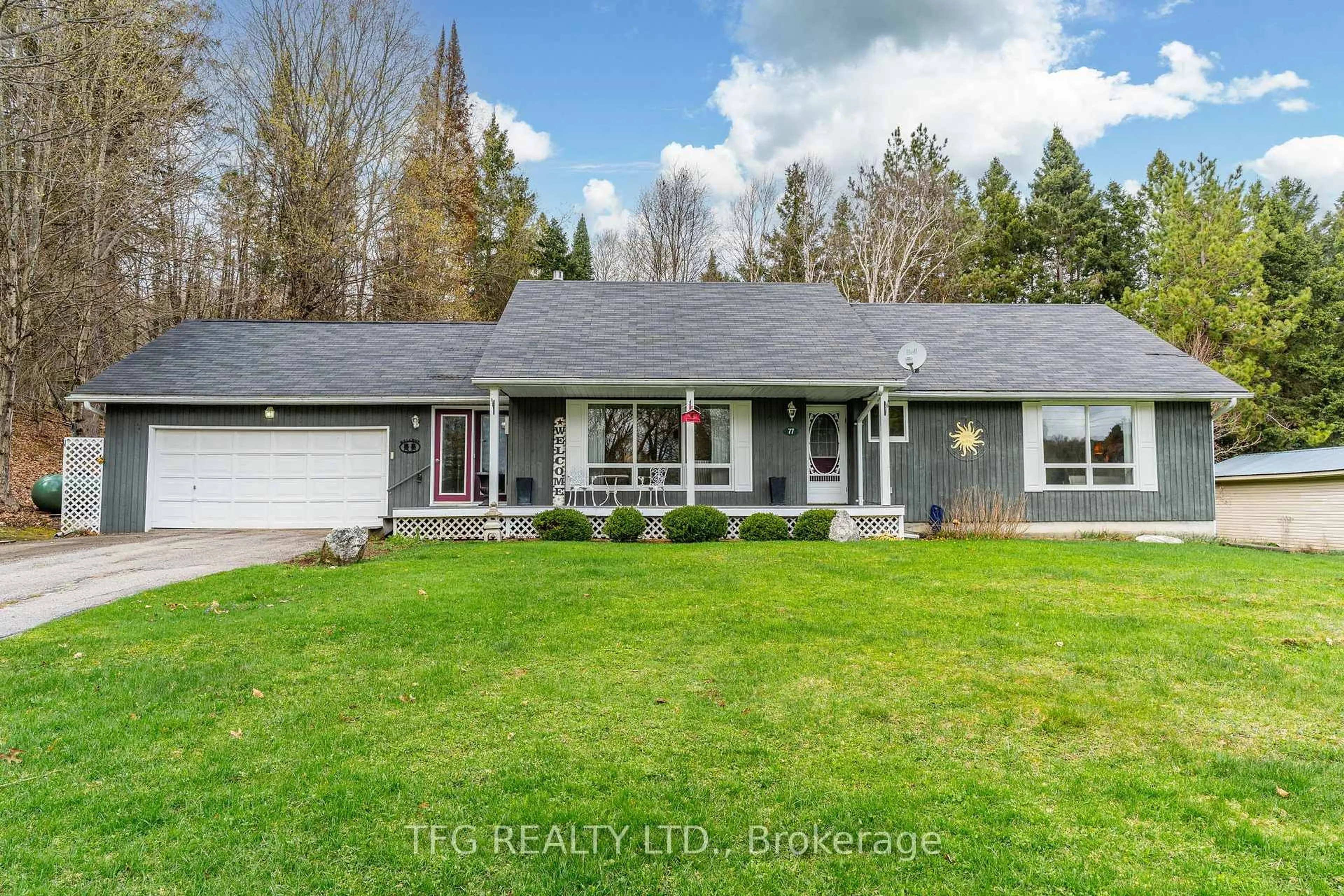 Home with vinyl exterior material, street for 77 Bayshore Rd, Dysart et al Ontario K0M 1S0