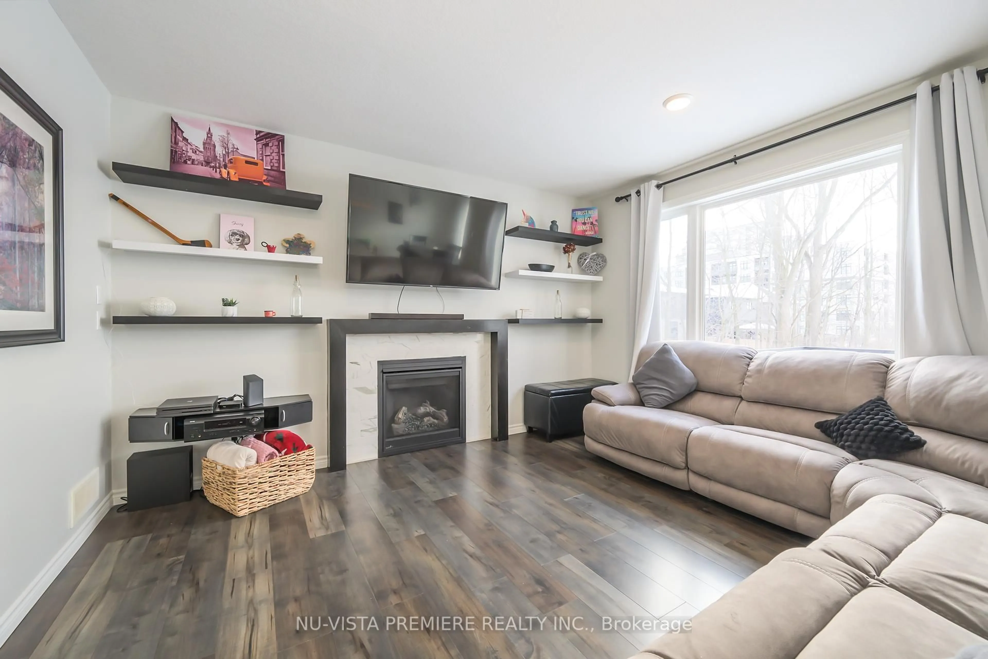 Living room with furniture, wood/laminate floor for 457 Jessica Way Rd, London North Ontario N6H 5L4