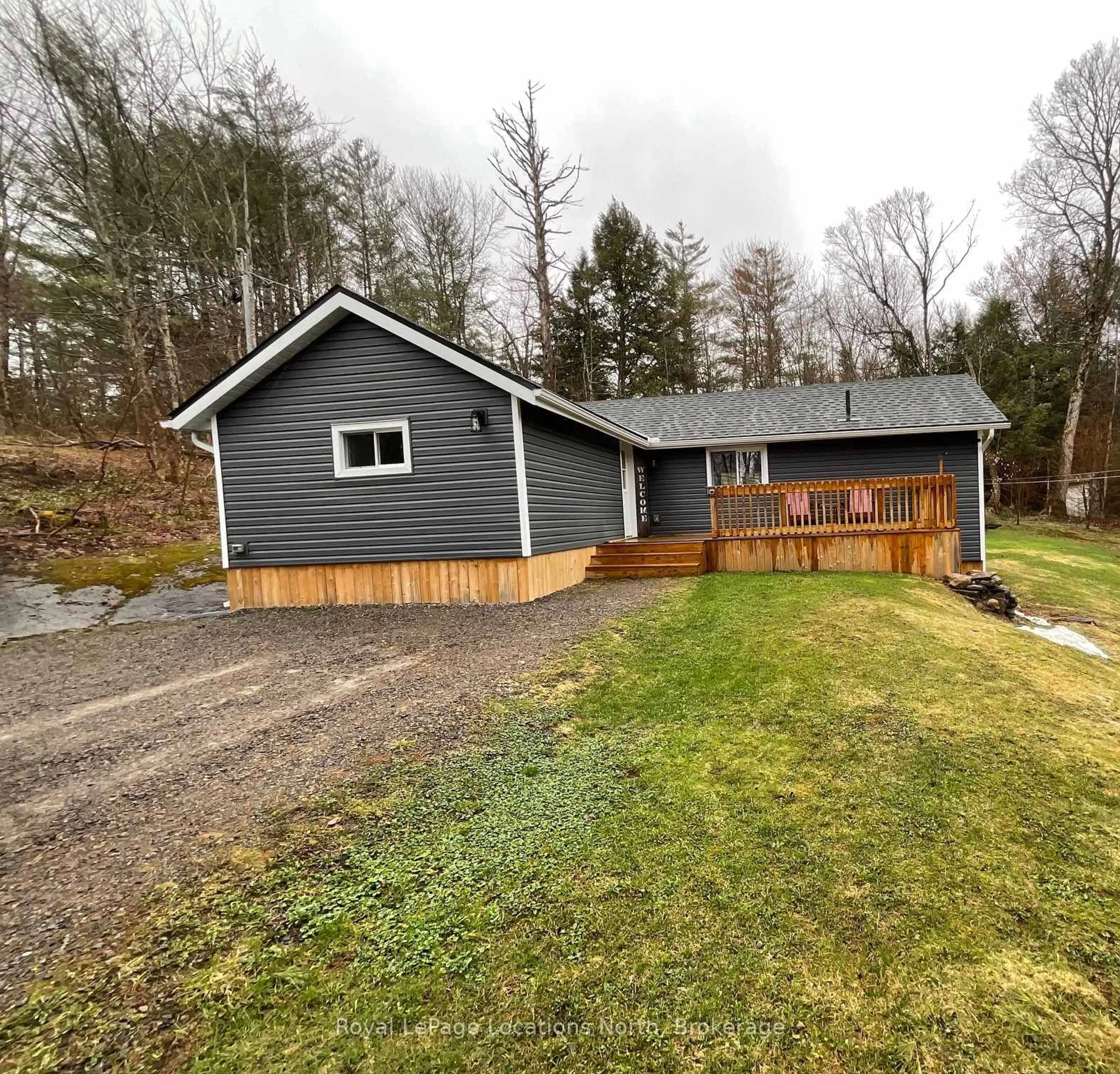 A pic from outside/outdoor area/front of a property/back of a property/a pic from drone, unknown for 1005 FOX POINT Rd, Bracebridge Ontario P1L 1X1