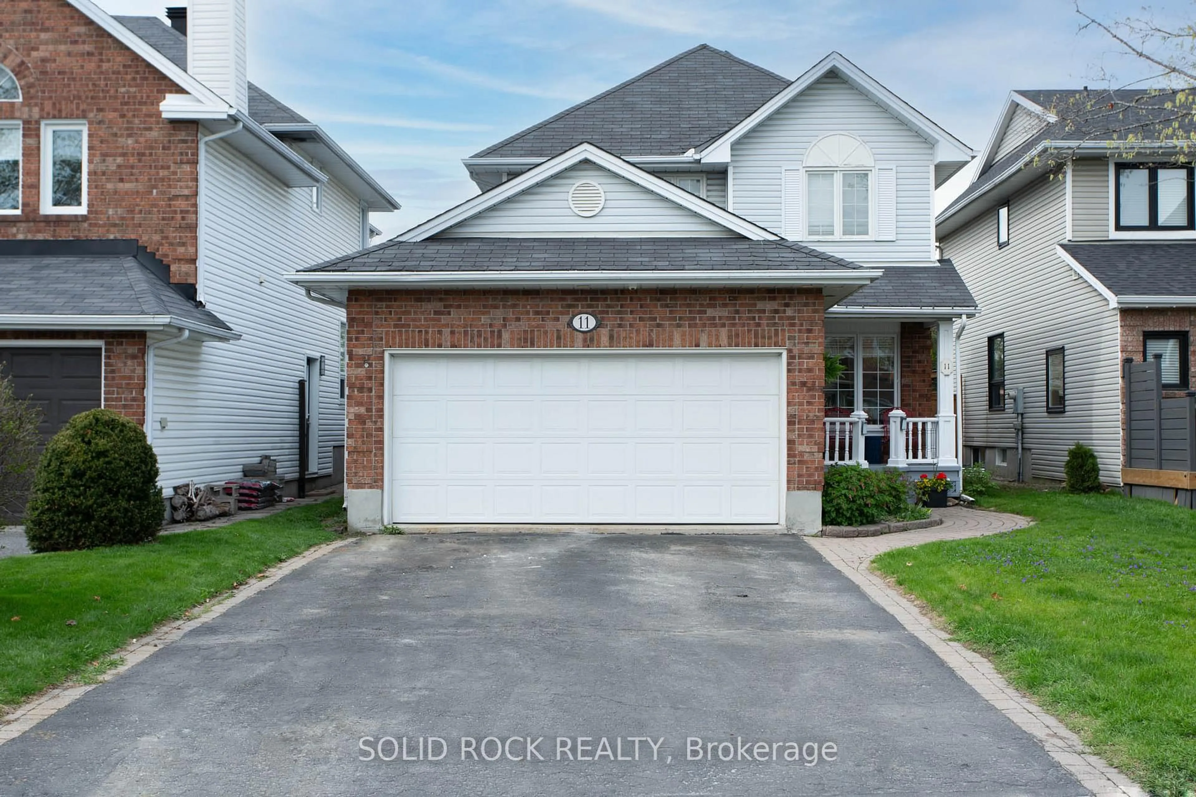 Home with brick exterior material, street for 11 Royal Field Cres, Ottawa Ontario K2J 4G1