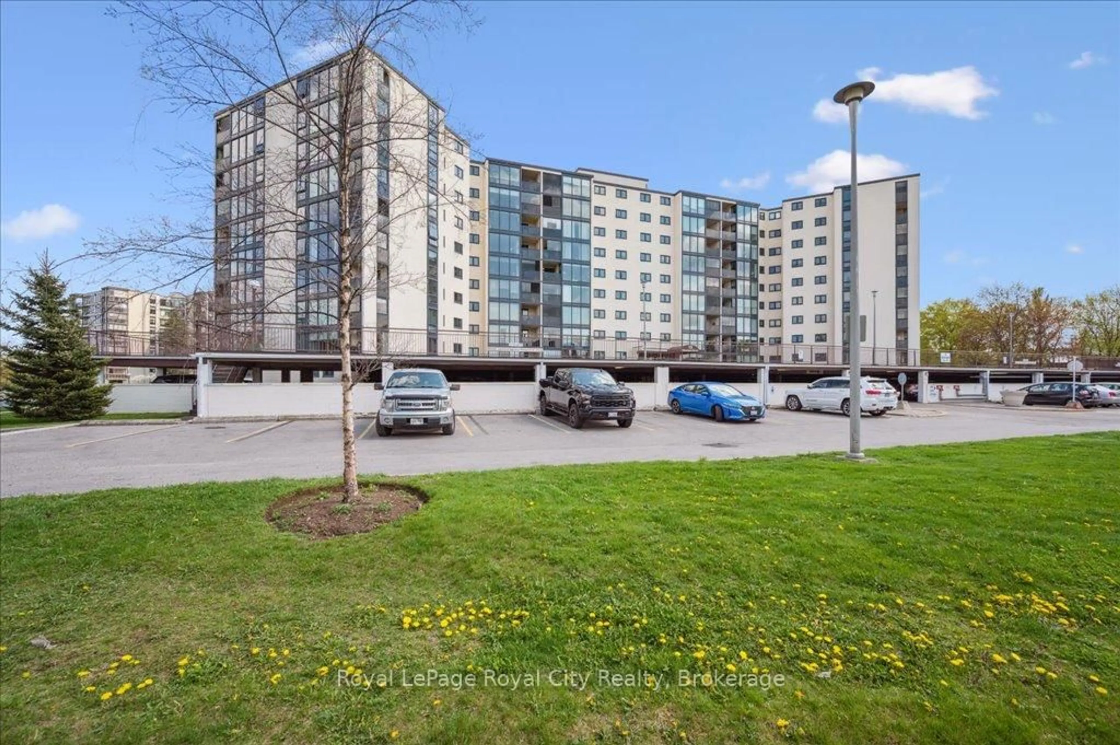 A pic from outside/outdoor area/front of a property/back of a property/a pic from drone, unknown for 19 Woodlawn Rd #311, Guelph Ontario N1H 7B1