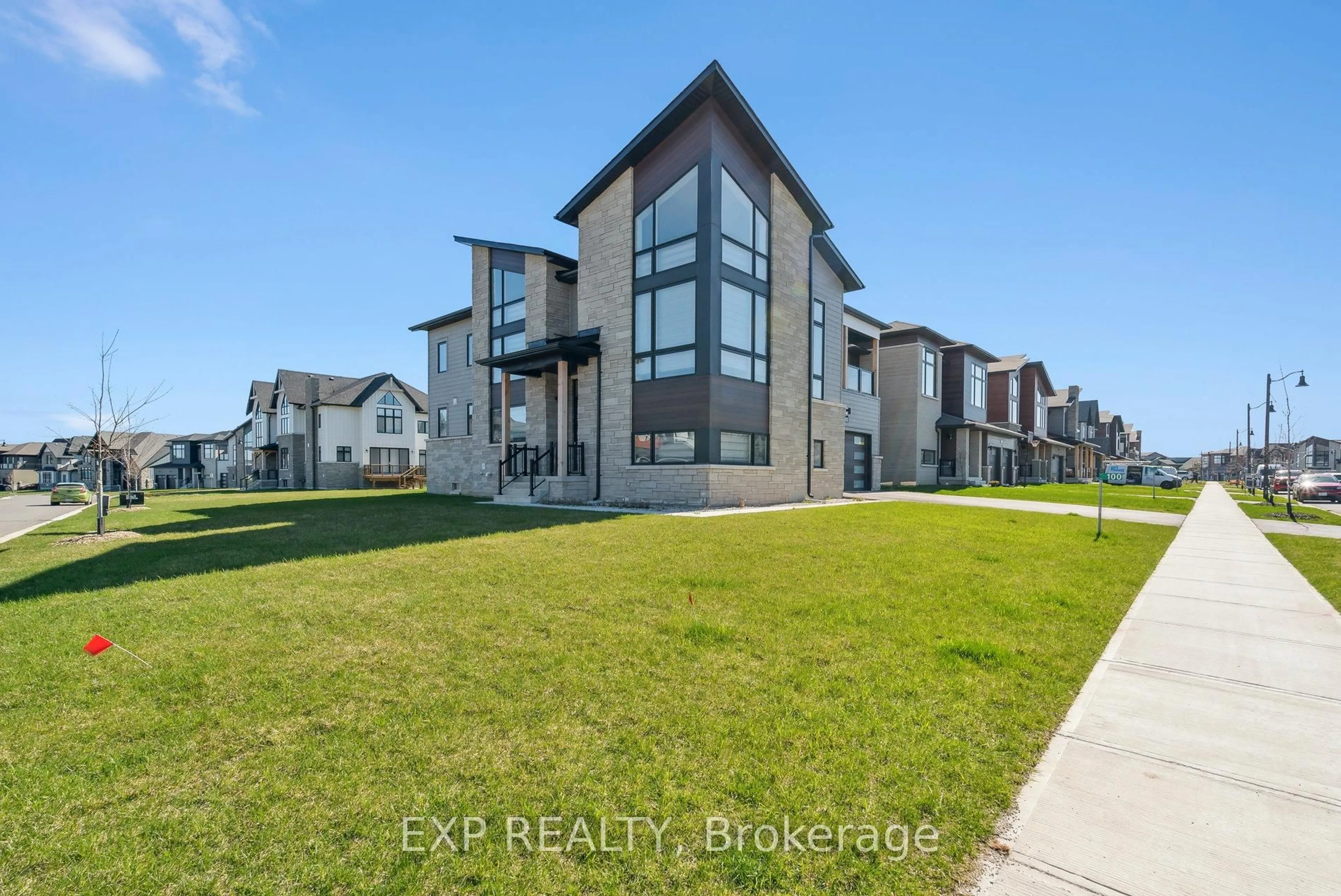 A pic from outside/outdoor area/front of a property/back of a property/a pic from drone, water/lake/river/ocean view for 100 Stoneleigh Dr, Blue Mountains Ontario L9Y 5J6