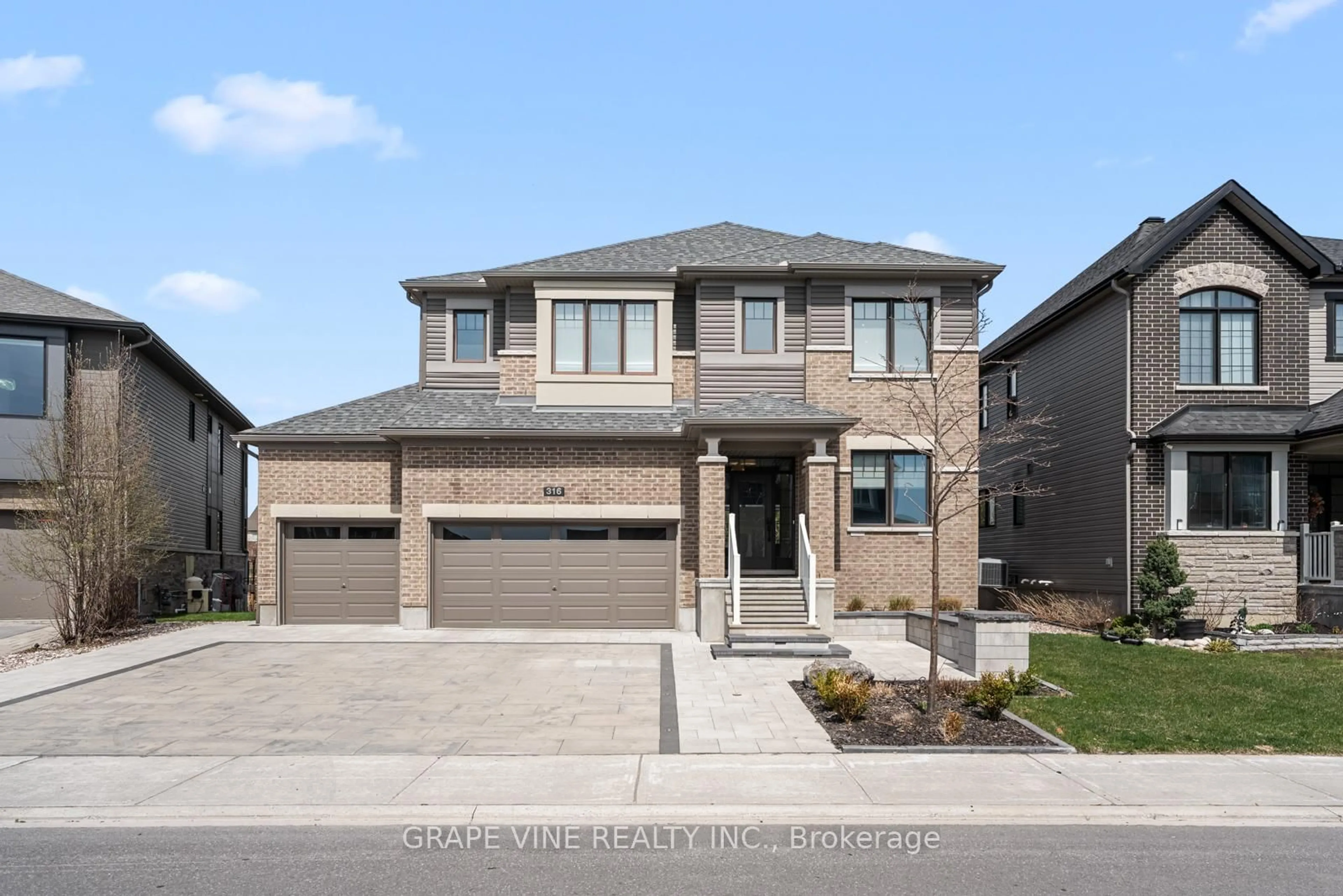 Home with brick exterior material, street for 316 Eaglehead Cres, Stittsville Ontario K2S 2J1
