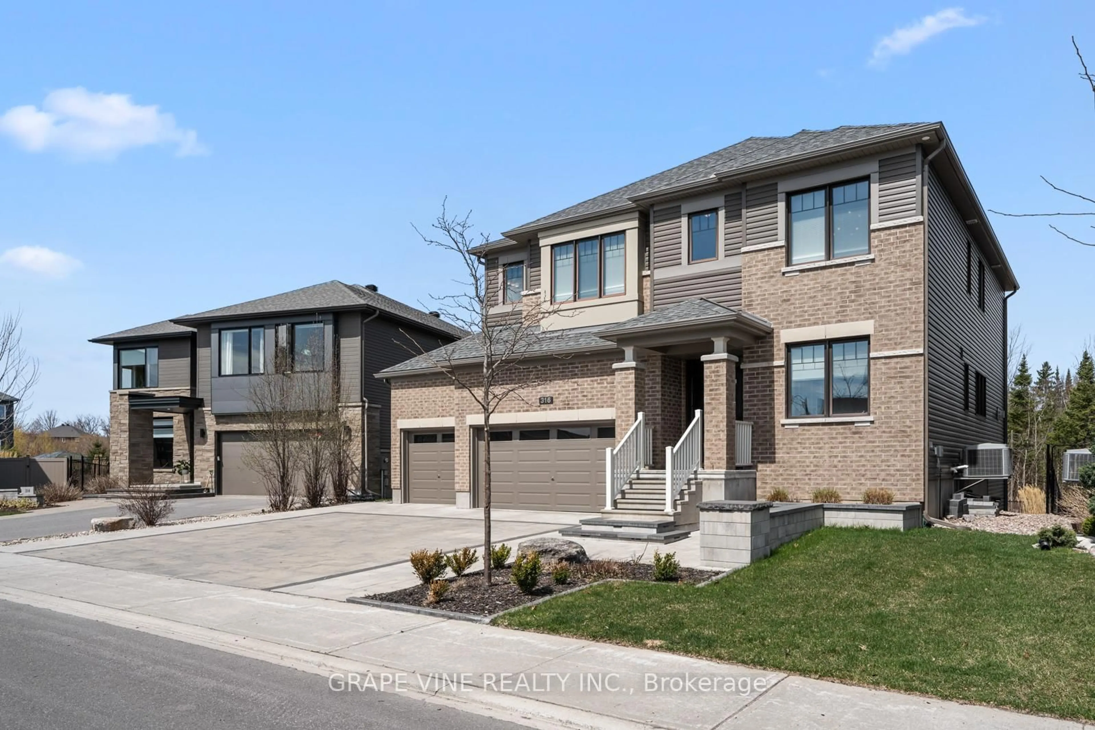 Home with brick exterior material, street for 316 Eaglehead Cres, Stittsville Ontario K2S 2J1