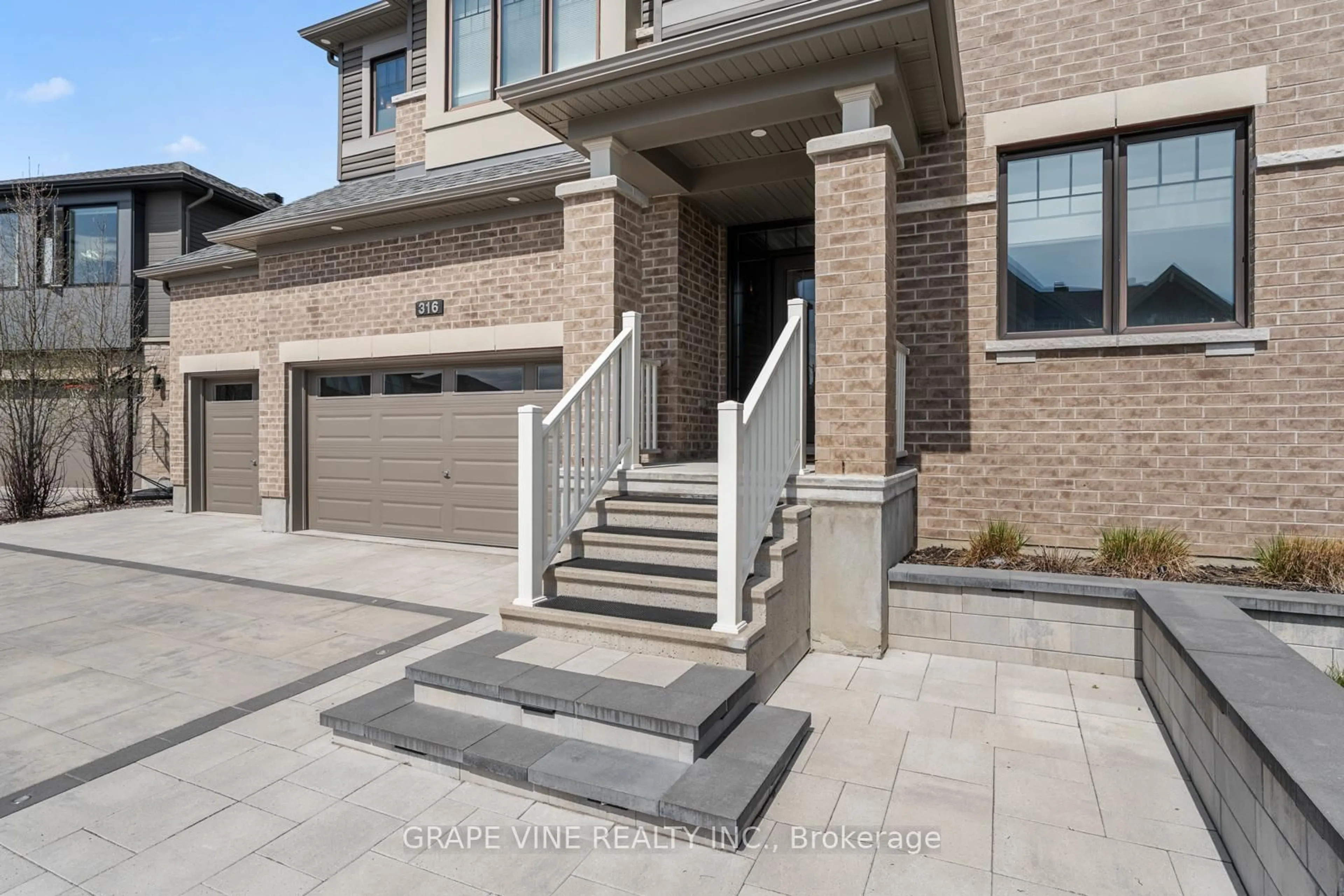 Home with brick exterior material, street for 316 Eaglehead Cres, Stittsville Ontario K2S 2J1