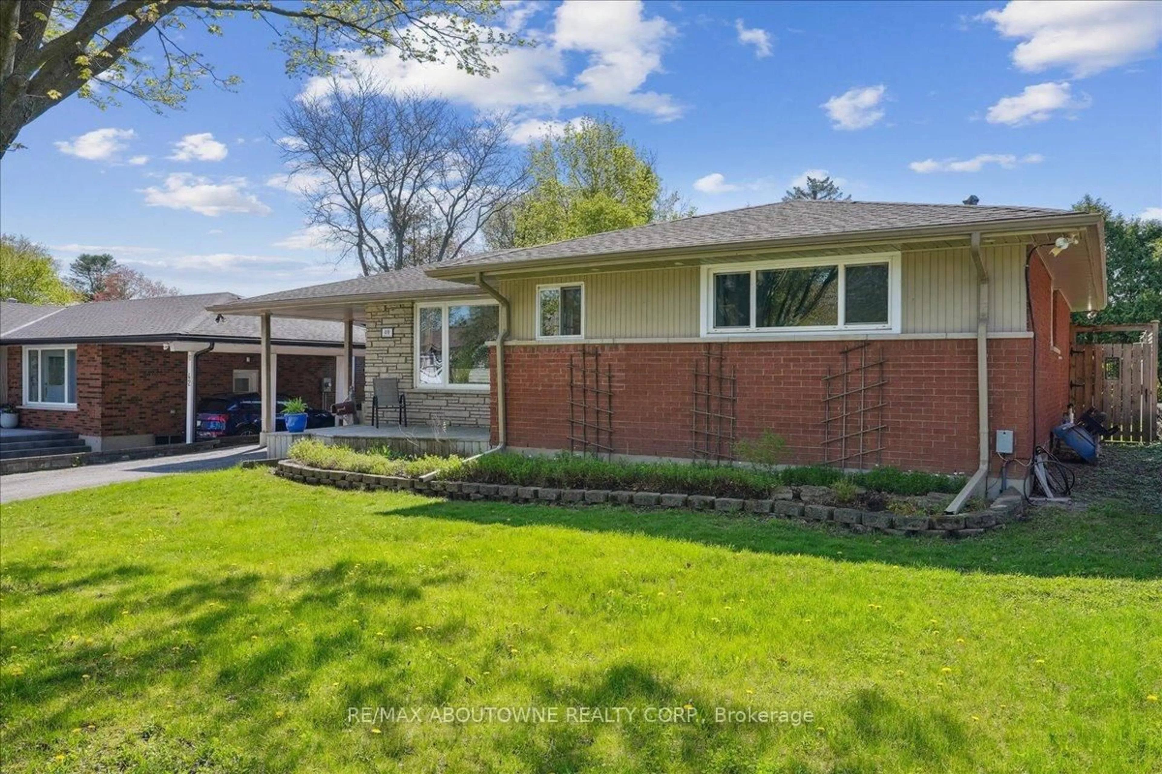 Home with brick exterior material, street for 40 Autumn Leaf Rd, Hamilton Ontario L9H 3V7
