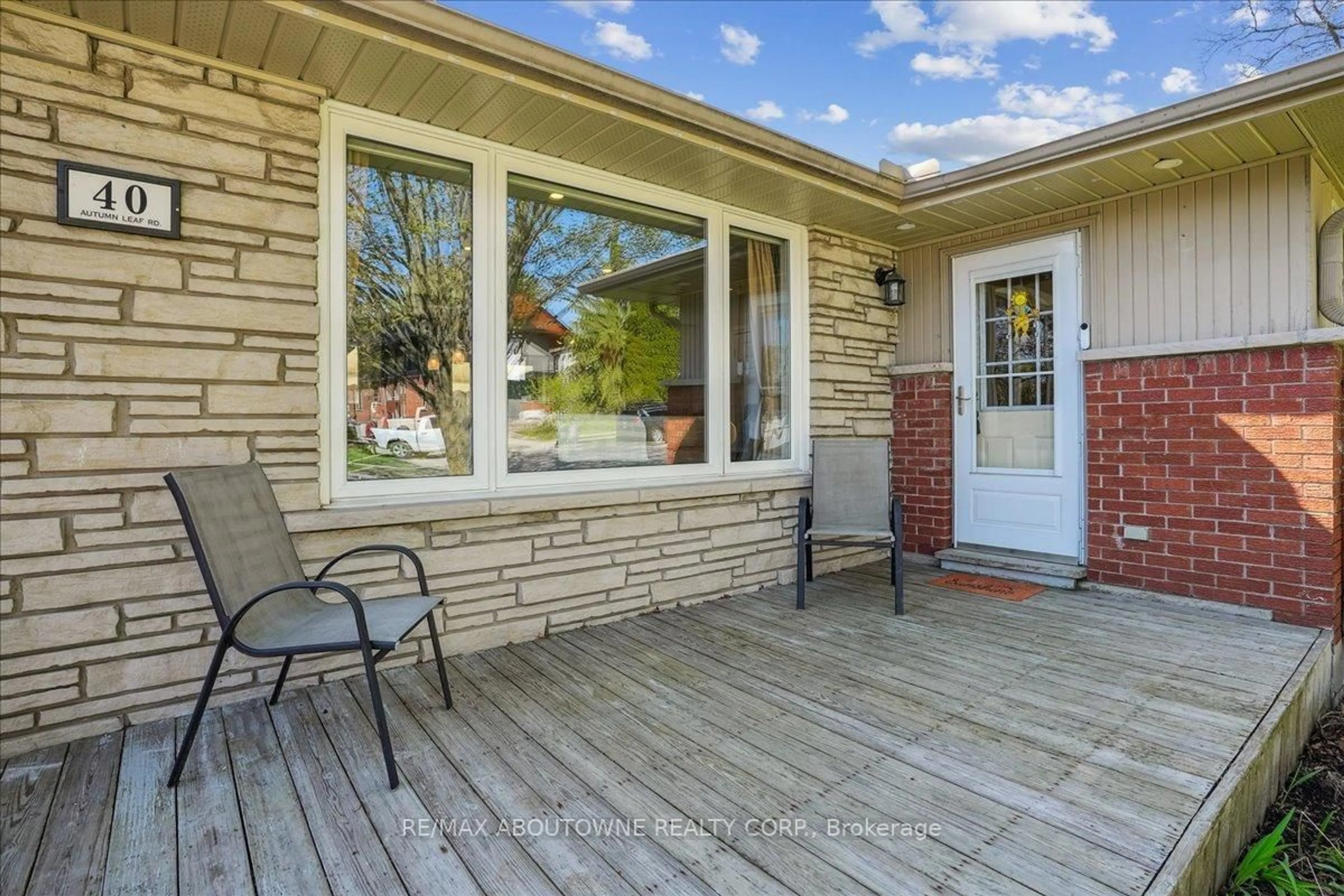 Home with brick exterior material, street for 40 Autumn Leaf Rd, Hamilton Ontario L9H 3V7