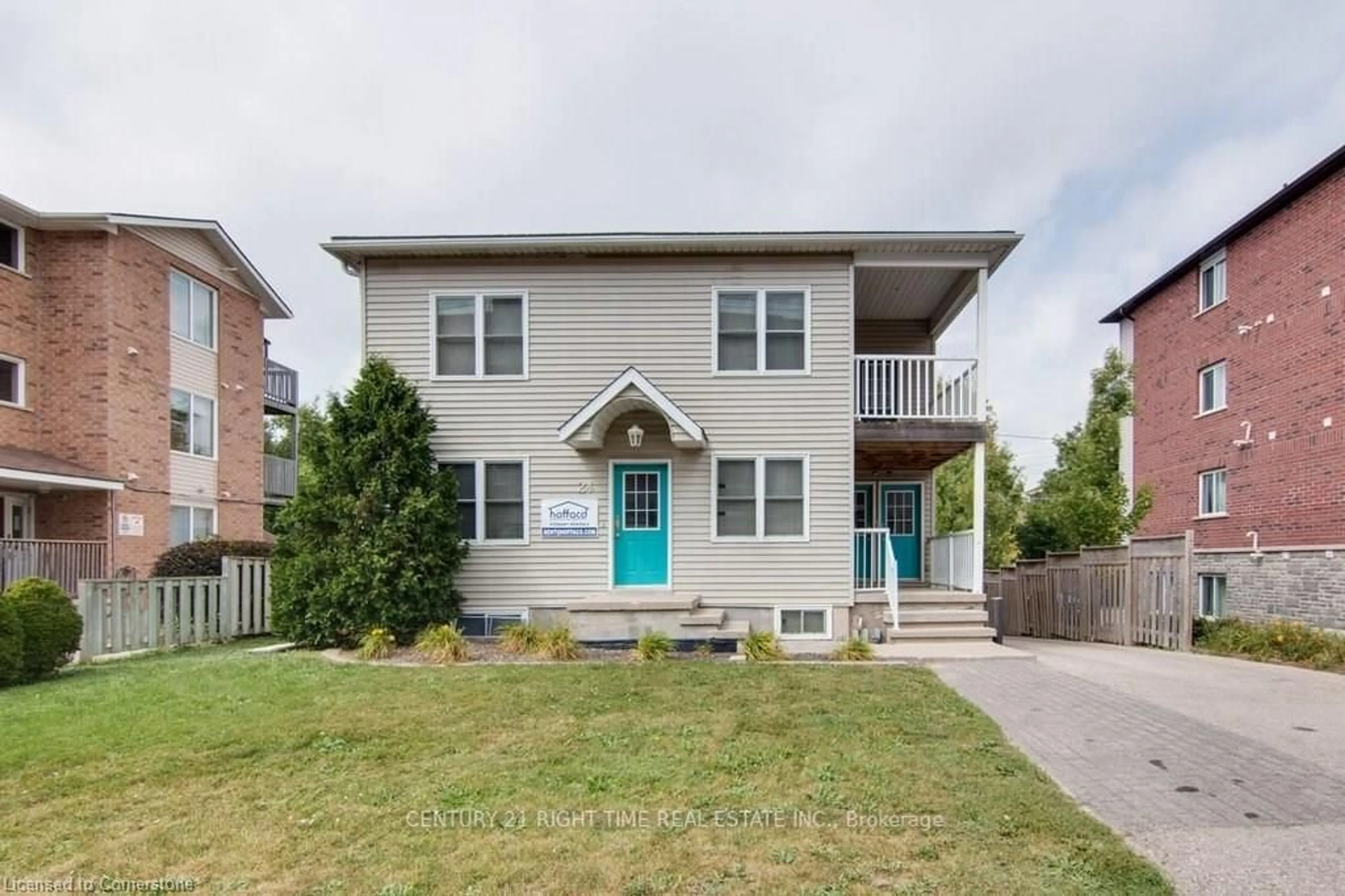 Home with brick exterior material, street for 24 Columbia St, Waterloo Ontario N2L 3K3