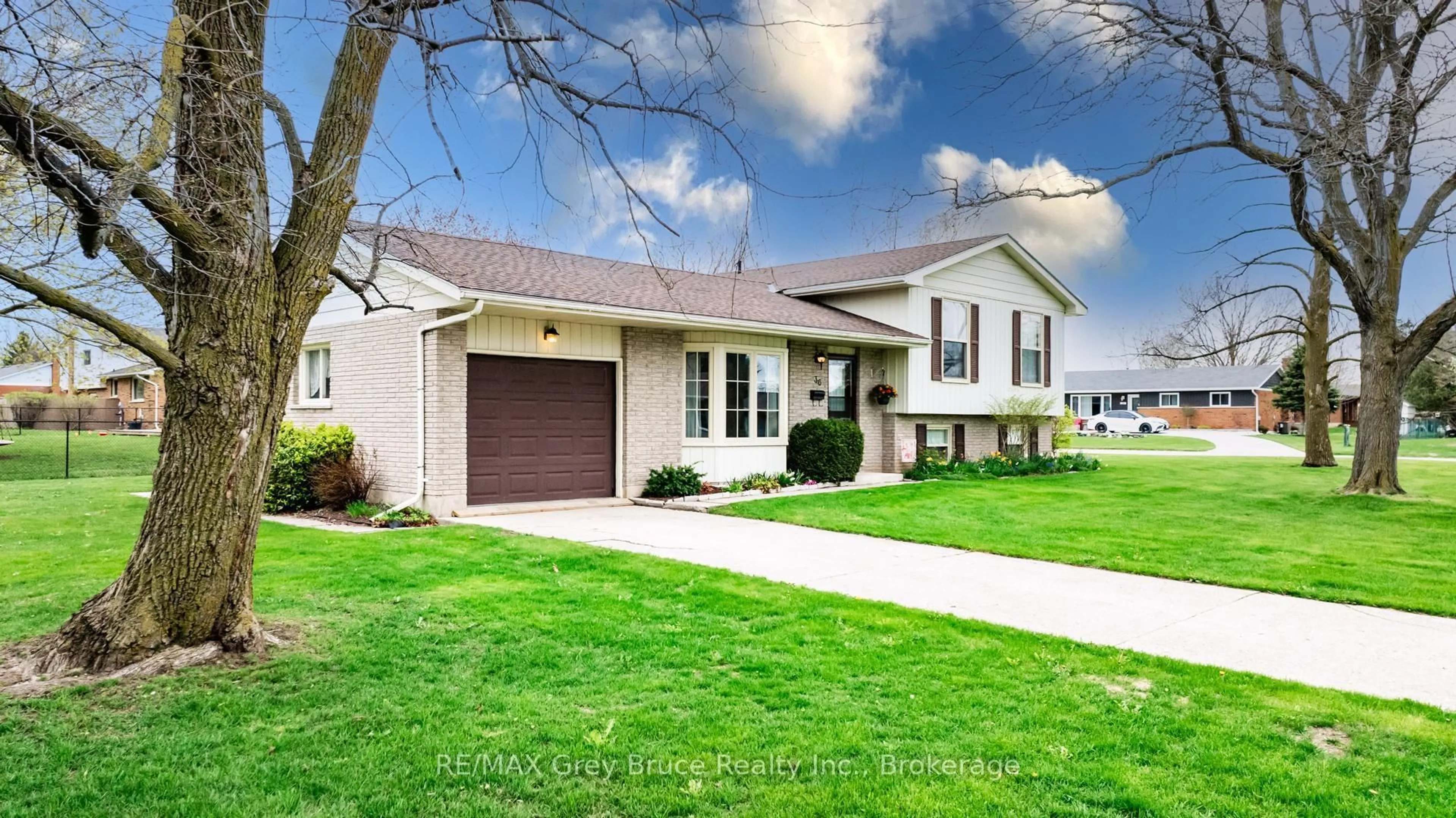 Home with vinyl exterior material, street for 36 Centennial St, Arran-Elderslie Ontario N0G 1L0