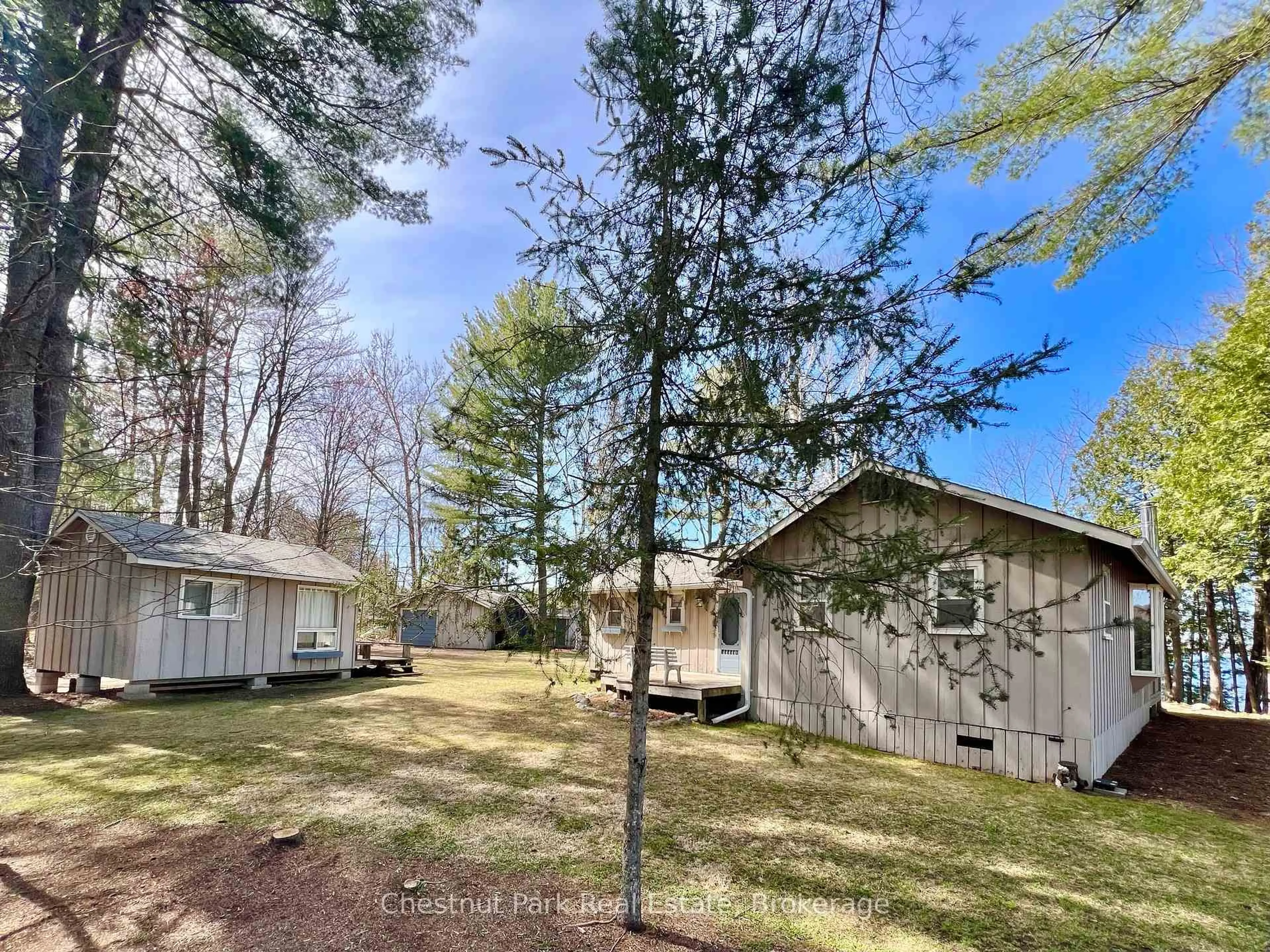 A pic from outside/outdoor area/front of a property/back of a property/a pic from drone, forest/trees view for 1036 Abbey Lane, Algonquin Highlands Ontario K0M 2K0