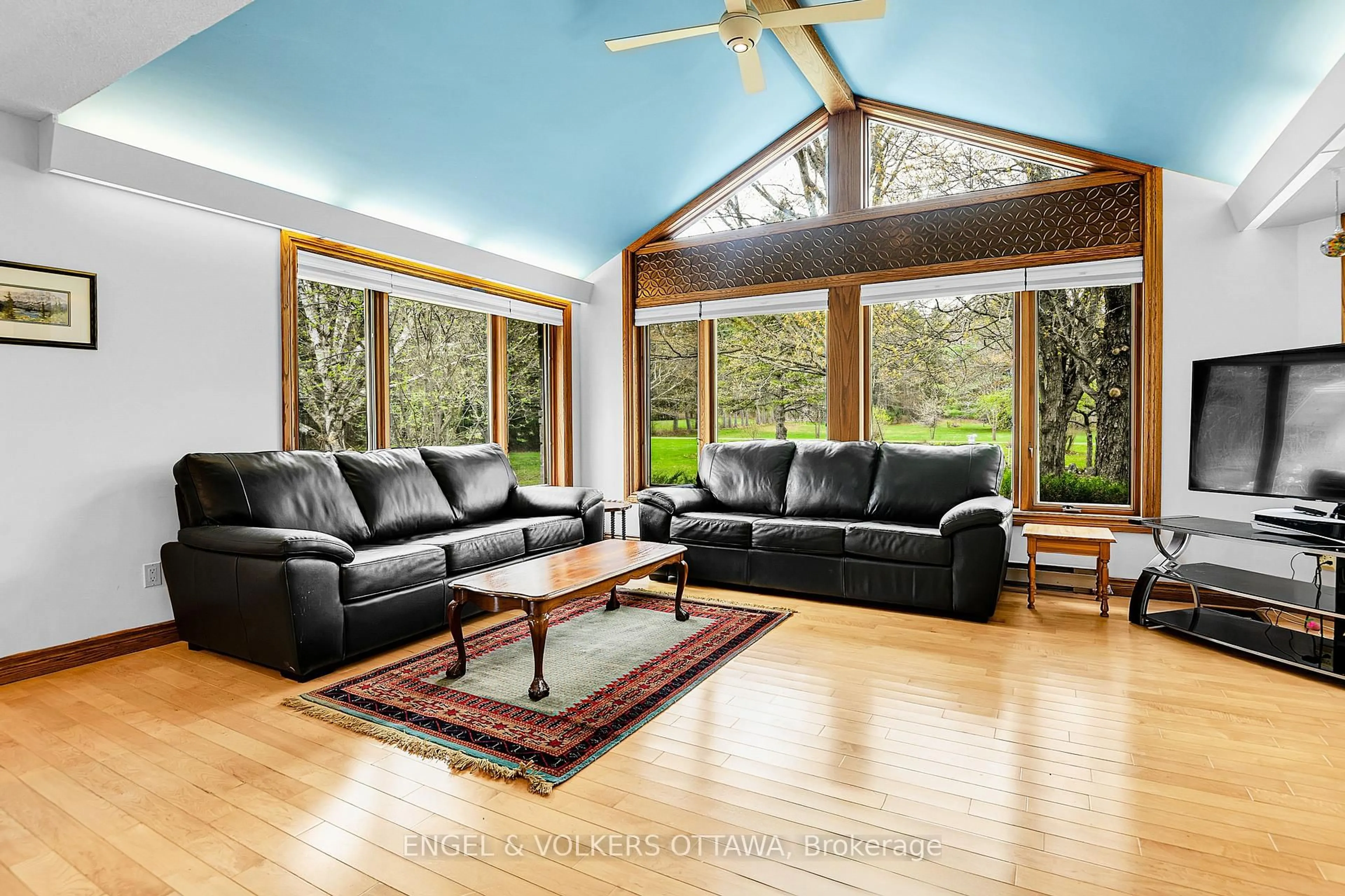 Living room with furniture, wood/laminate floor for 122 Colonel Nicholson Lane, Ottawa Ontario K0A 3M0