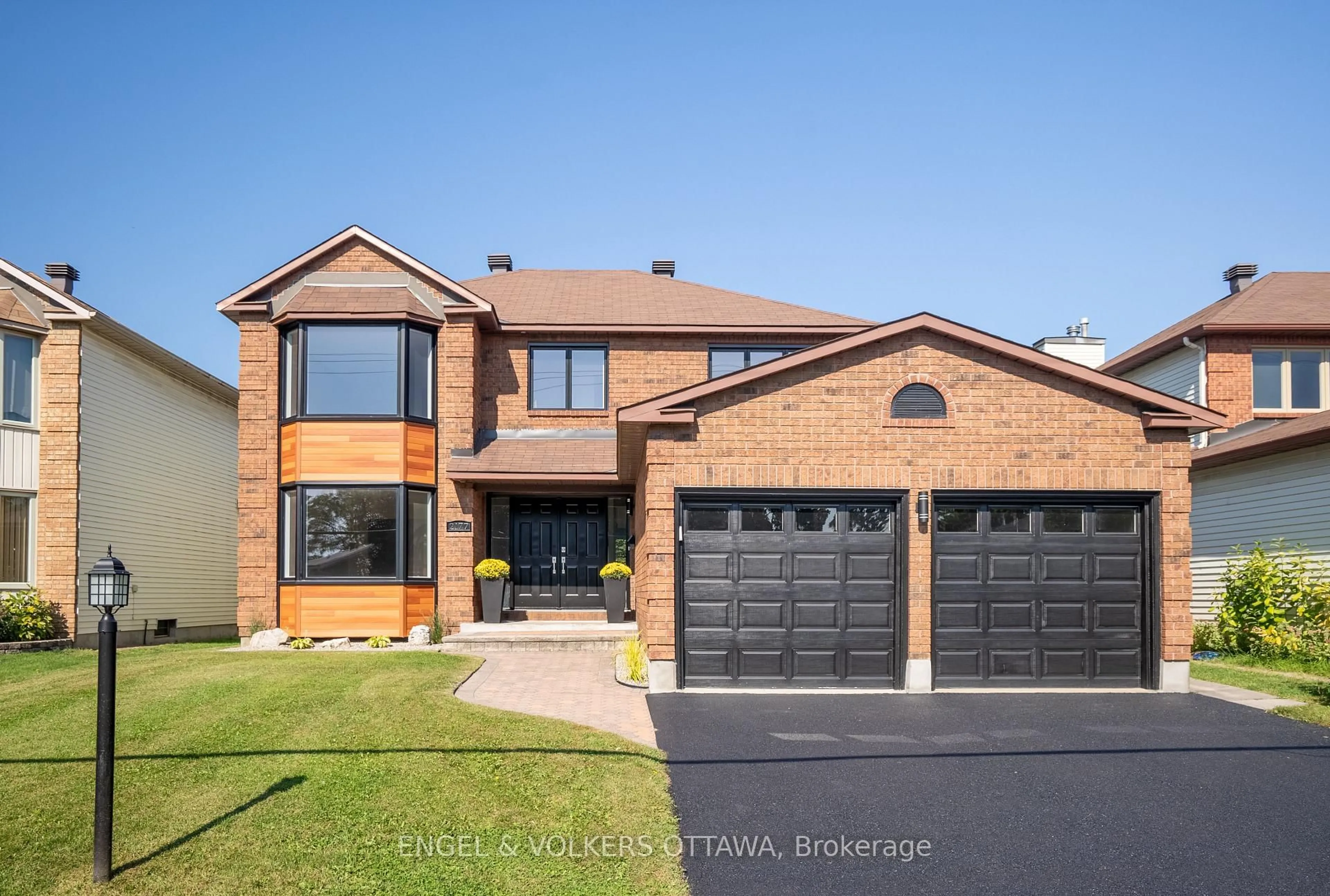Home with brick exterior material, street for 2177 Lenester Ave, Ottawa Ontario K2A 4A9