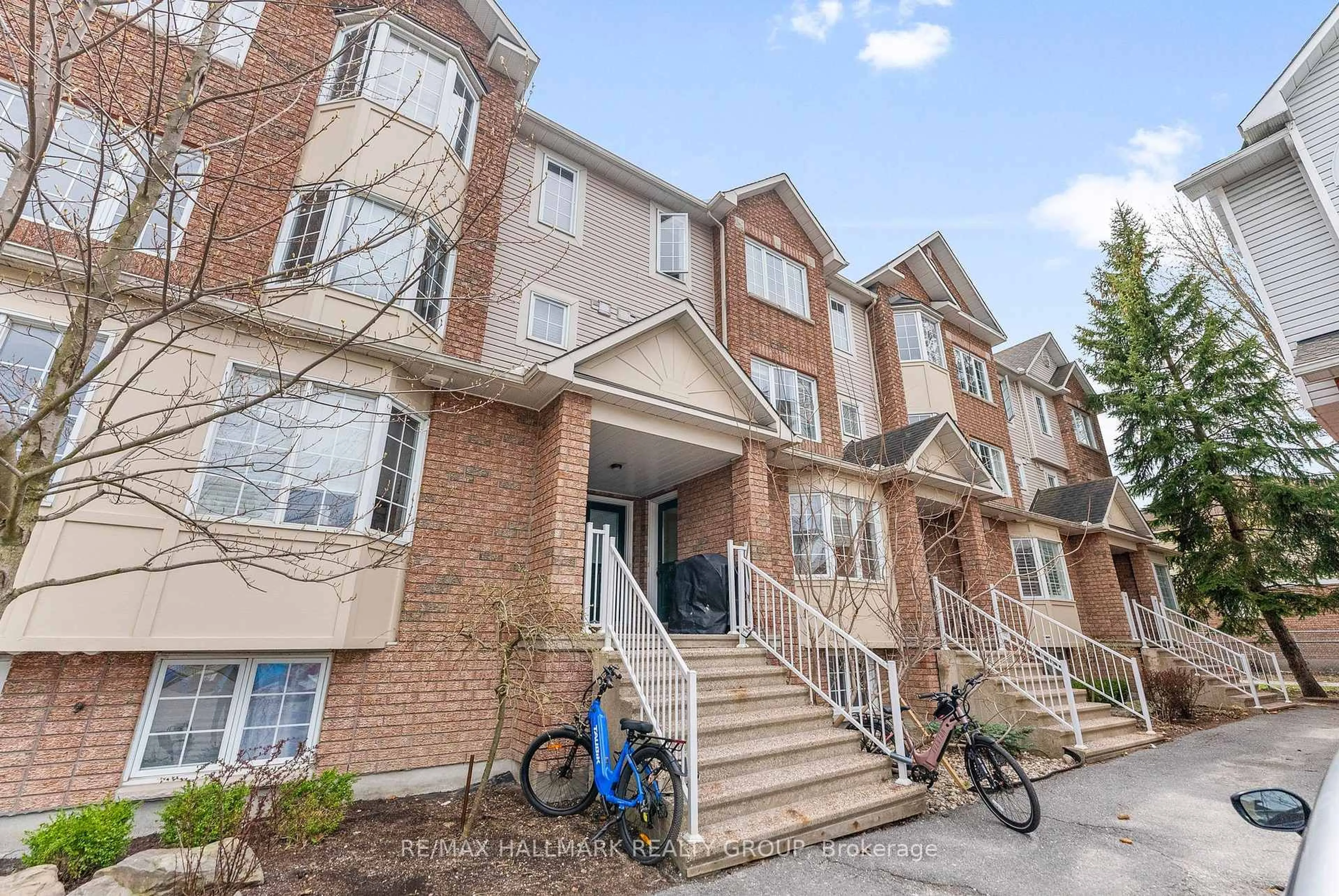 Home with brick exterior material, street for 110H Centrepointe Dr, Ottawa Ontario K2G 6K3