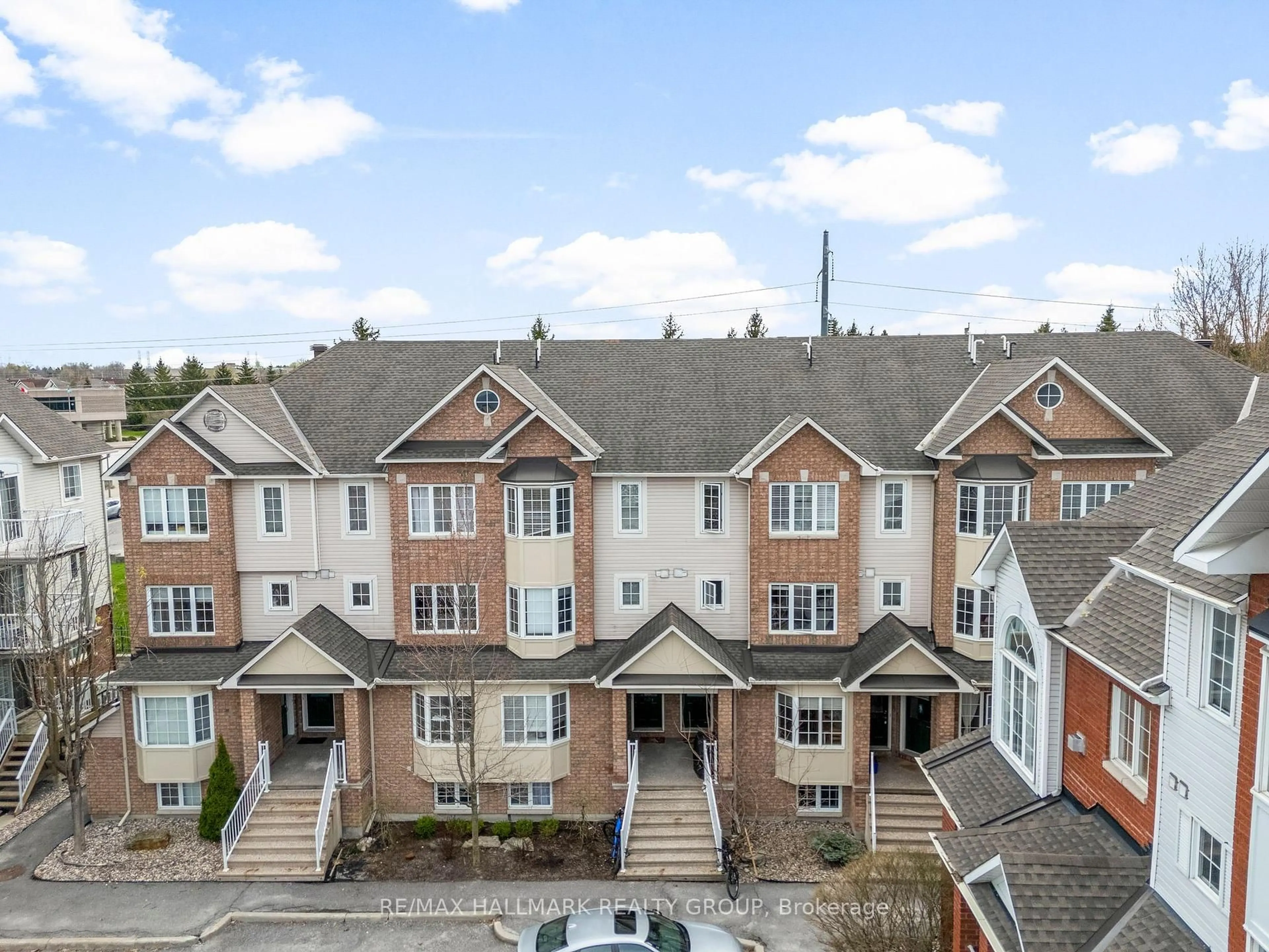 A pic from outside/outdoor area/front of a property/back of a property/a pic from drone, street for 110H Centrepointe Dr, Ottawa Ontario K2G 6K3