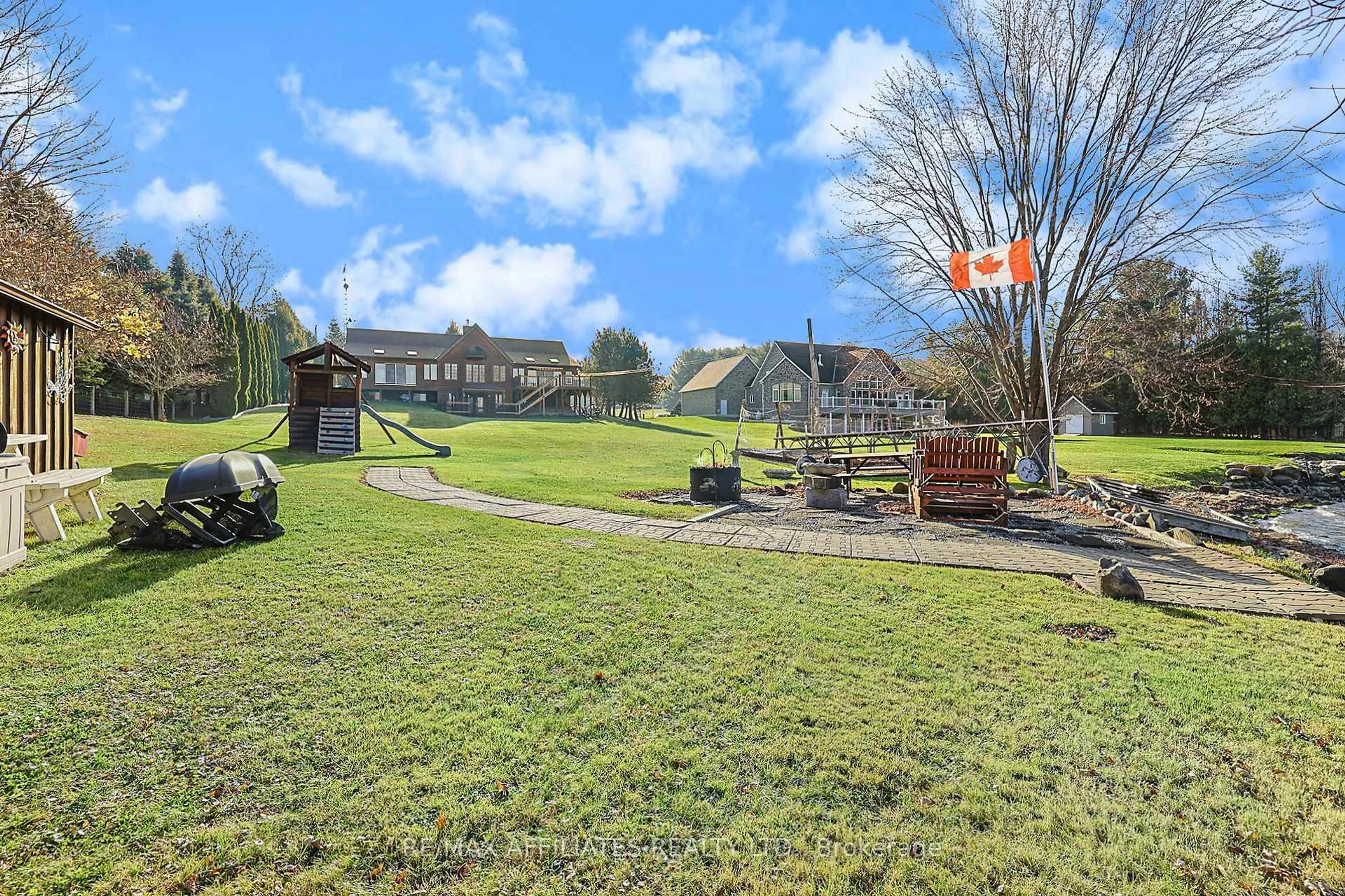 A pic from outside/outdoor area/front of a property/back of a property/a pic from drone, mountain view for 51 Mountain View Lane, Rideau Lakes Ontario K0G 1X0