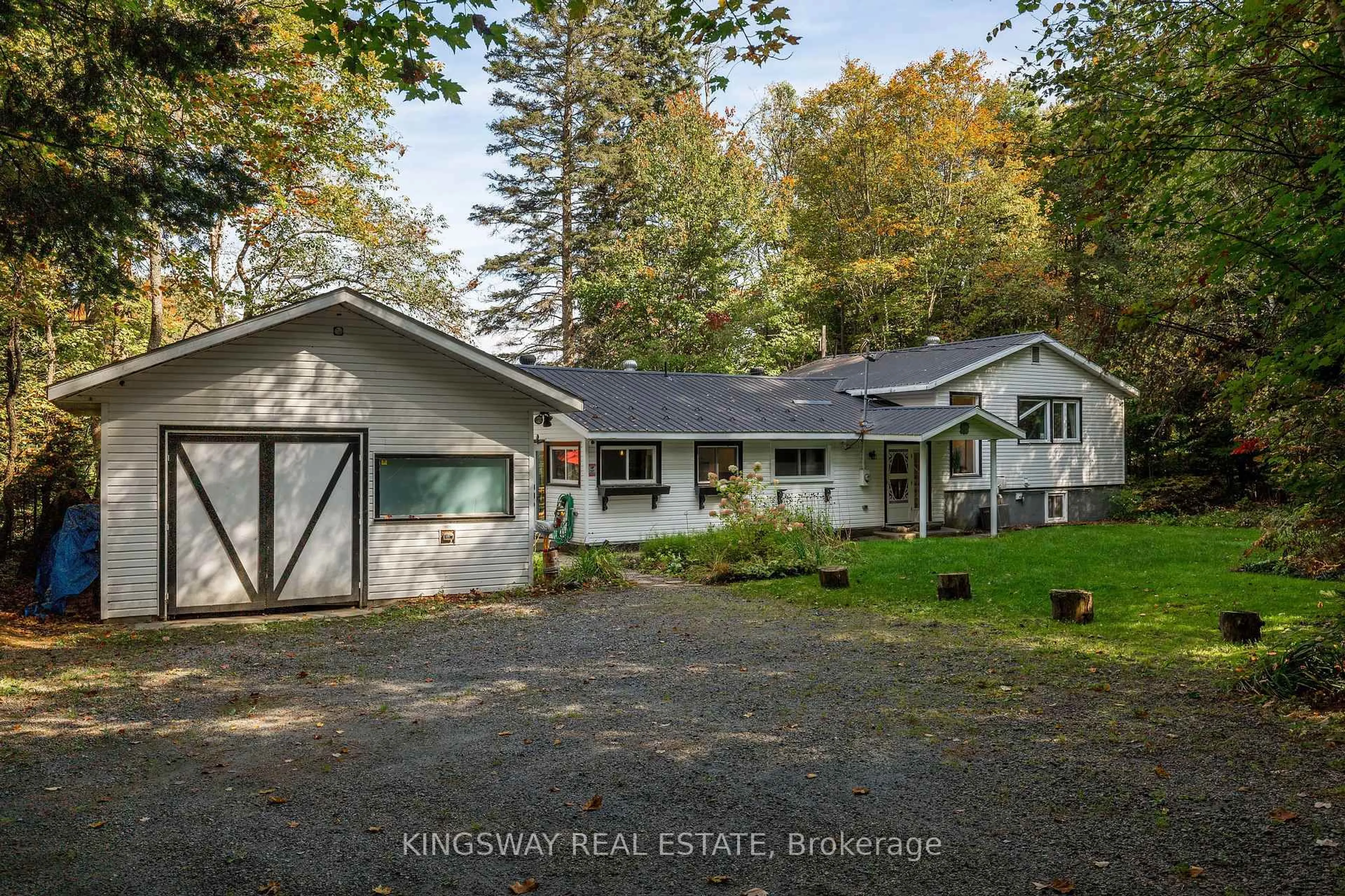 A pic from outside/outdoor area/front of a property/back of a property/a pic from drone, unknown for 325 Balsam Chutes Rd, Huntsville Ontario P0B 1L0
